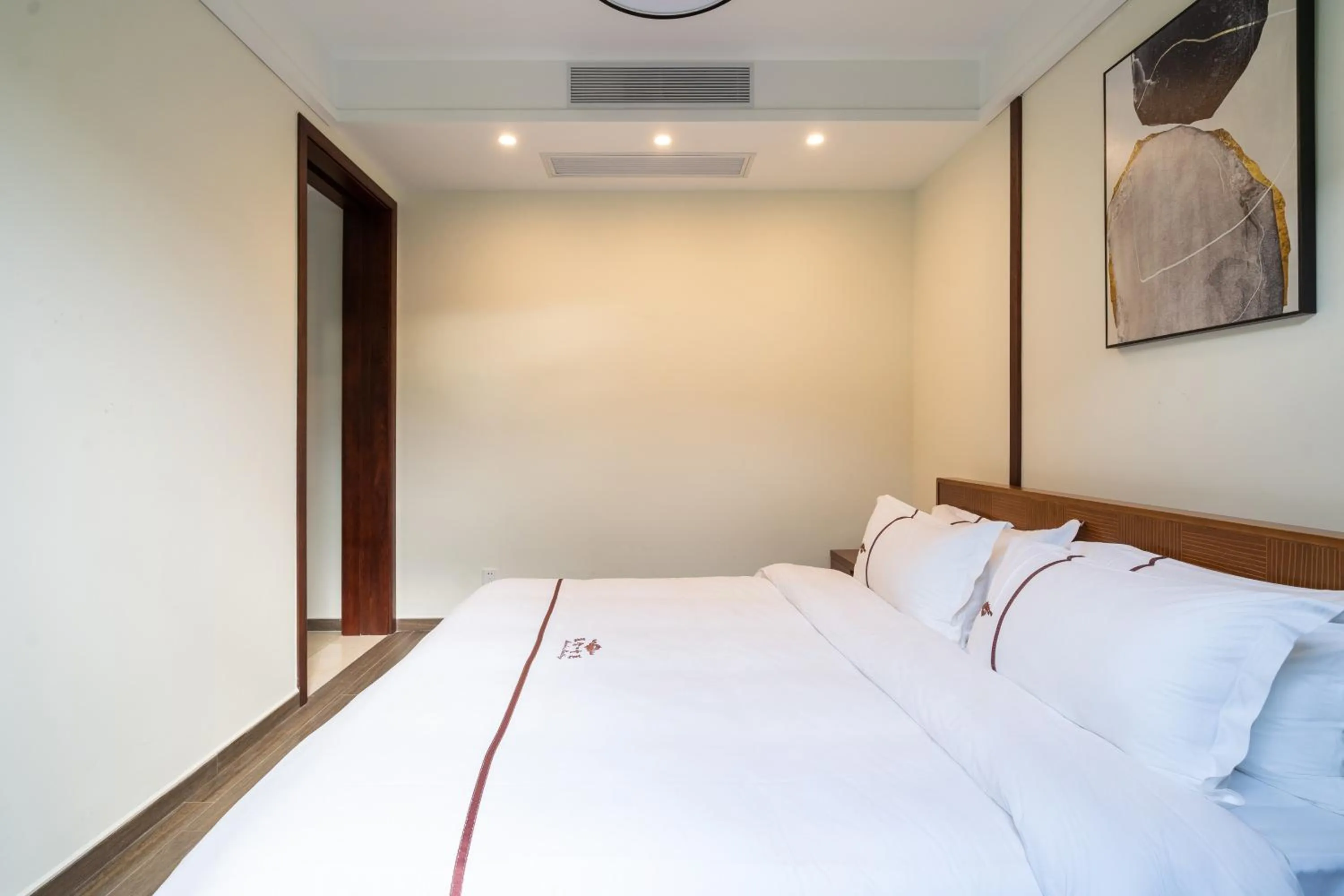 Bed in Iccssi Villa Haitang Bay Sanya