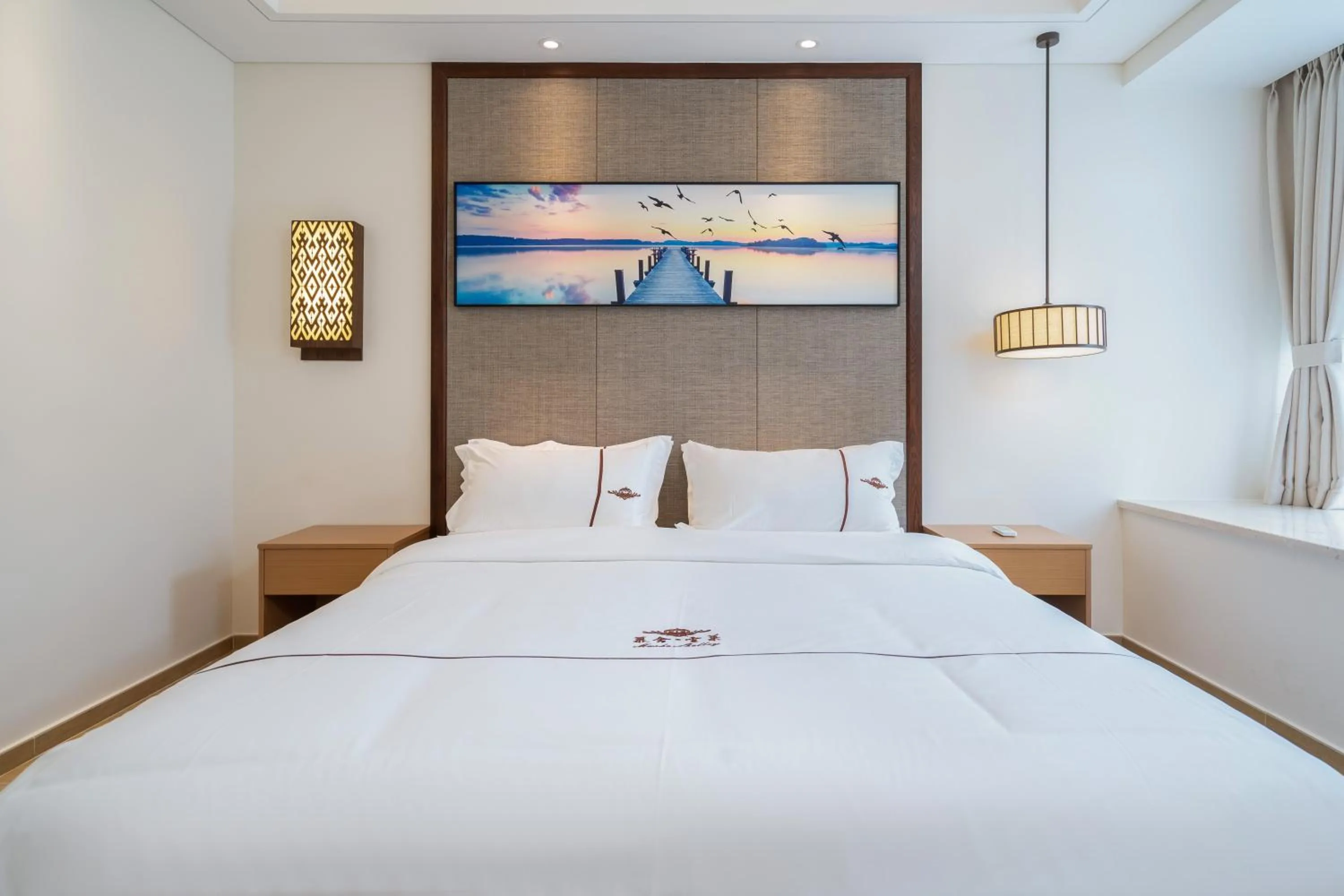 Bed in Iccssi Villa Haitang Bay Sanya