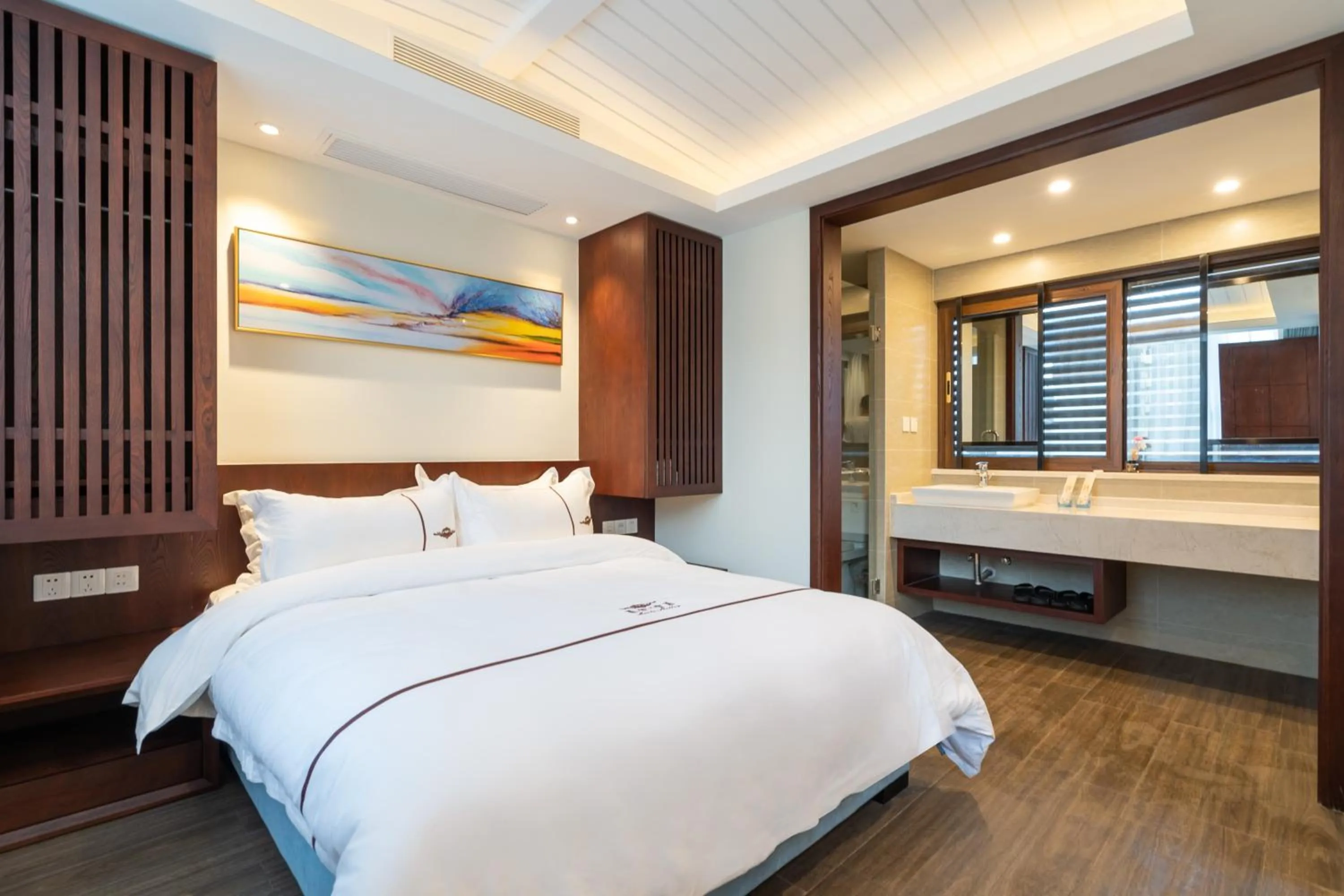 Bed in Iccssi Villa Haitang Bay Sanya
