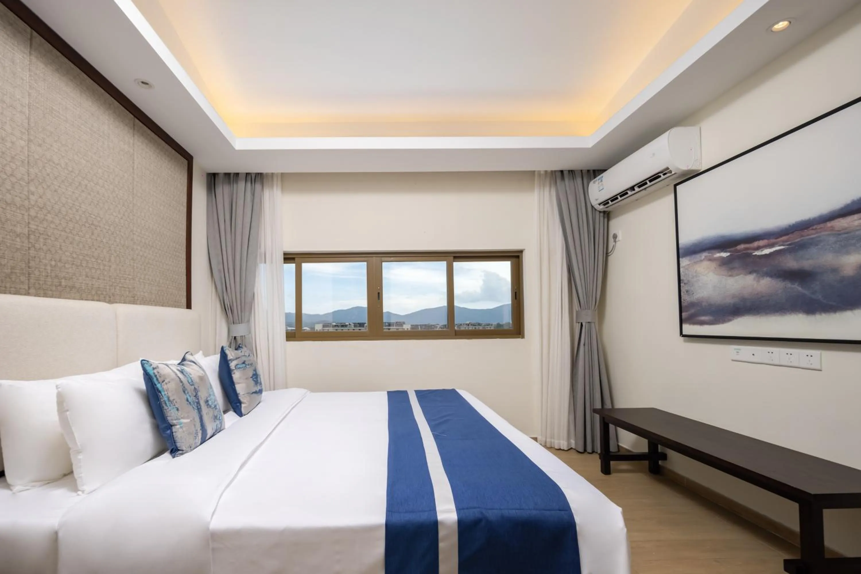 Bed in Iccssi Villa Haitang Bay Sanya