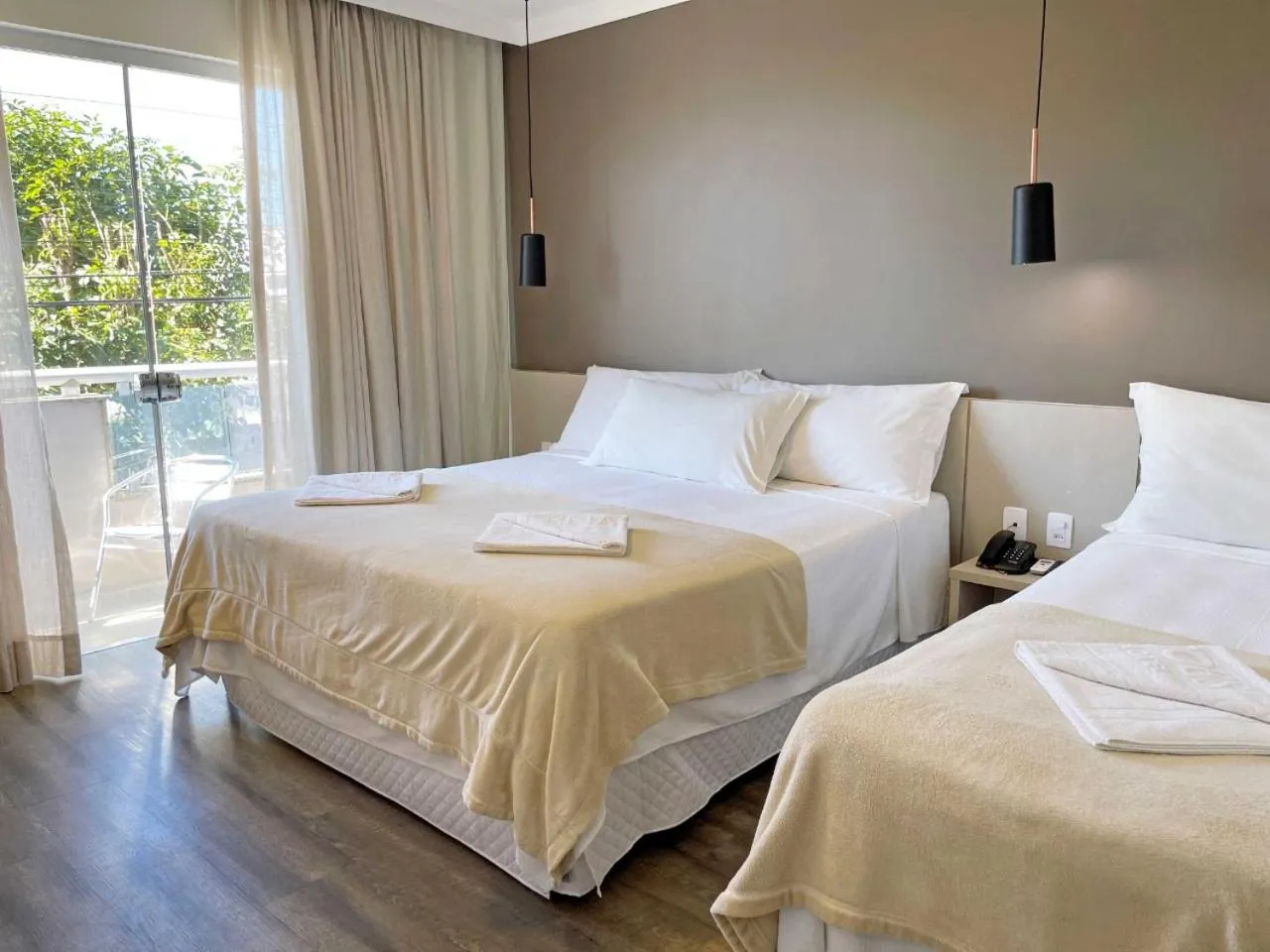 Bed in Das Nações Hotel