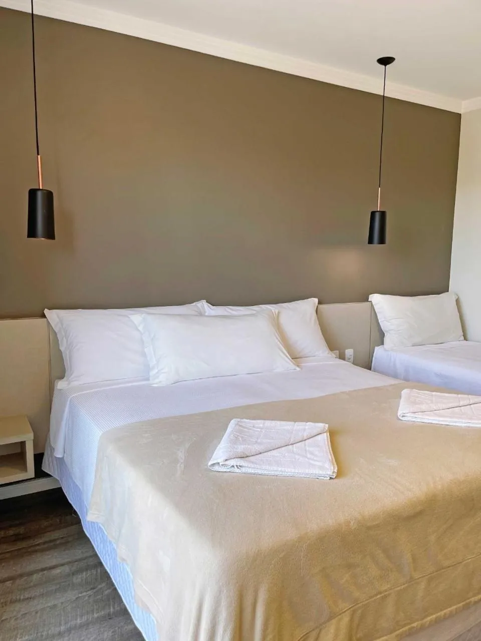 Bed in Das Nações Hotel