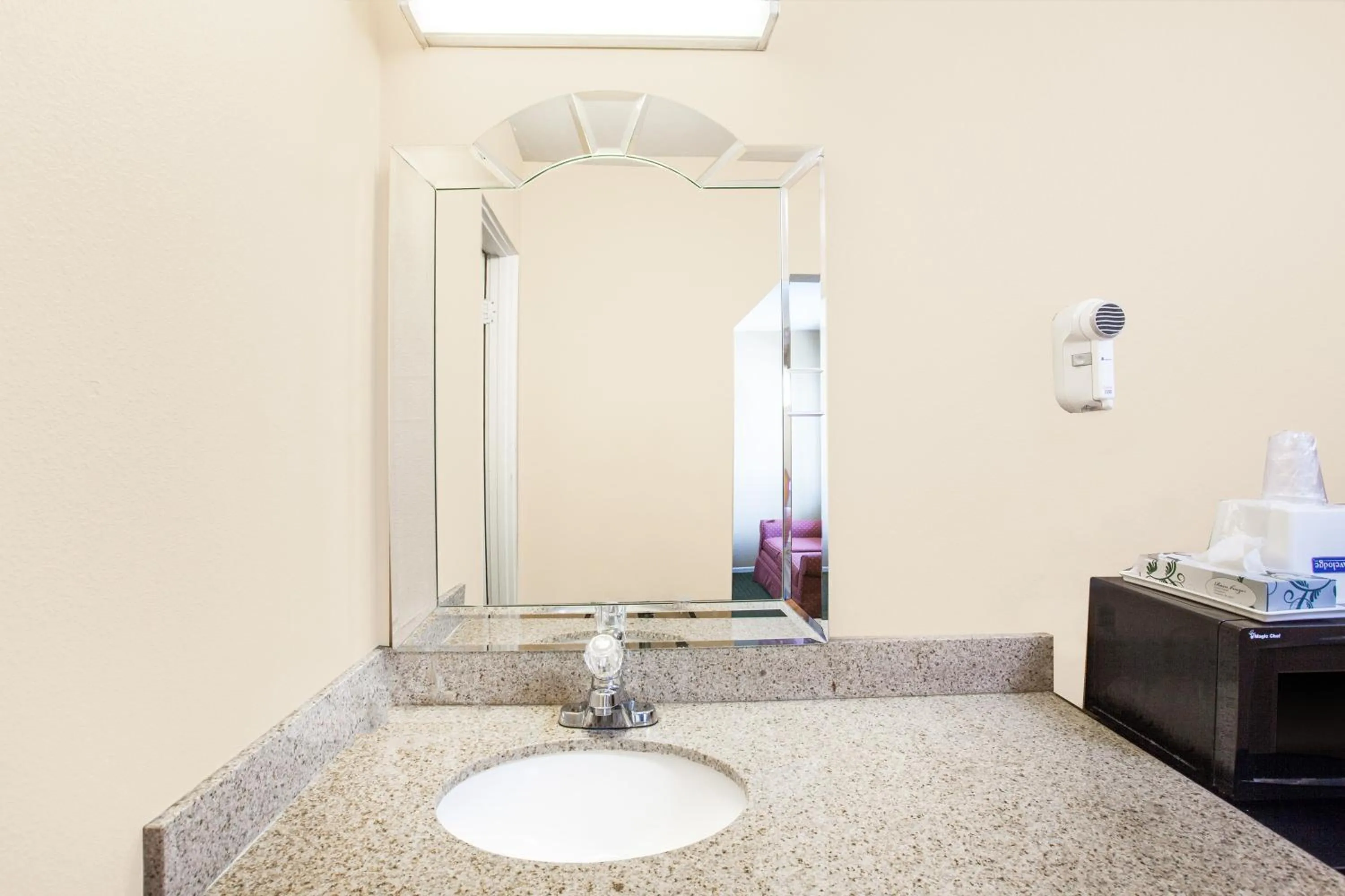 Toilet in Travelodge by Wyndham Barstow