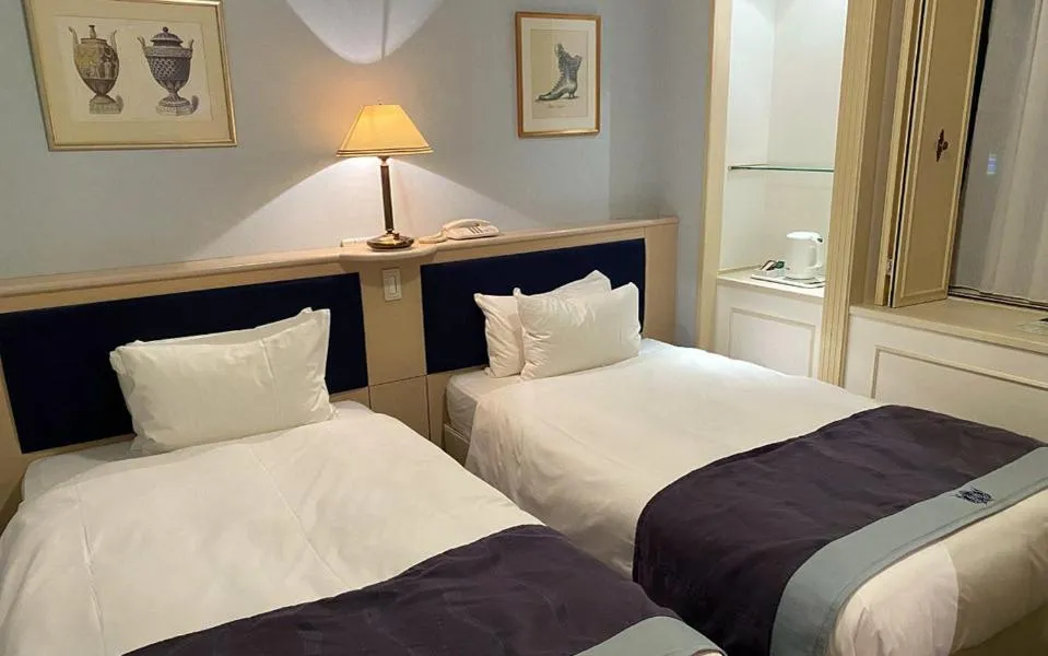 Bed in Hotel Monterey Osaka