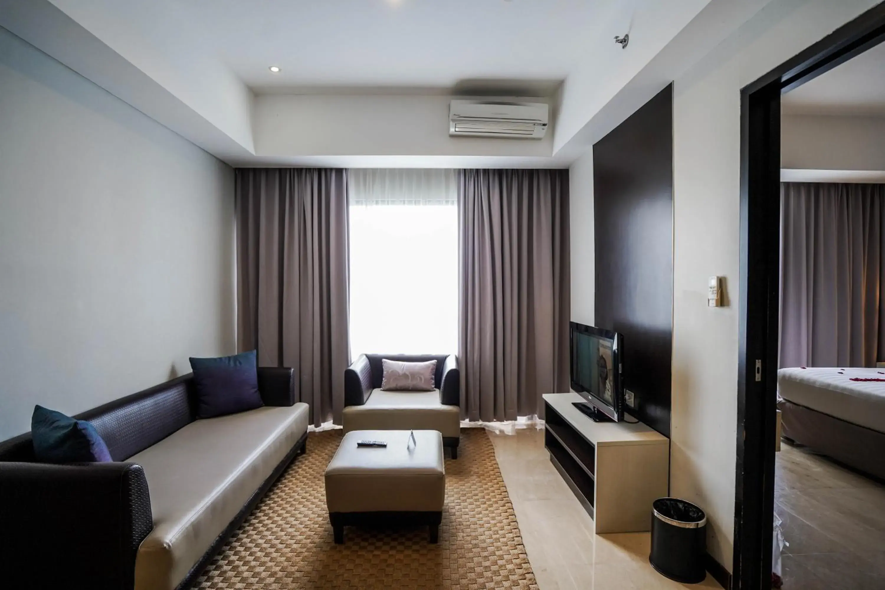 Living room, Bed in Soll Marina Hotel & Conference Center Bangka Living room, Bed in Soll Marina Hotel & Conference Center Bangka