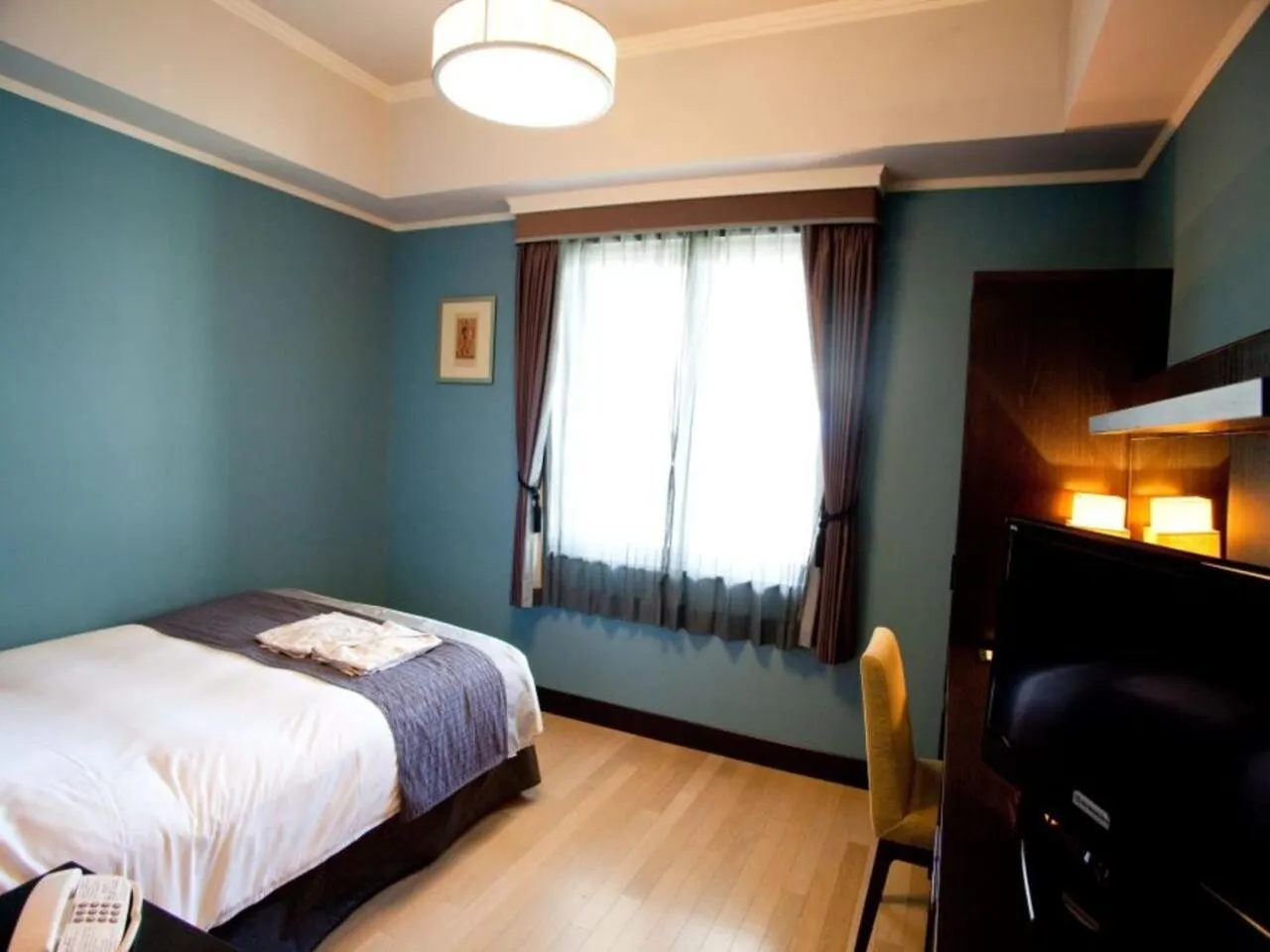 Bed in Hotel Monterey La Soeur Osaka