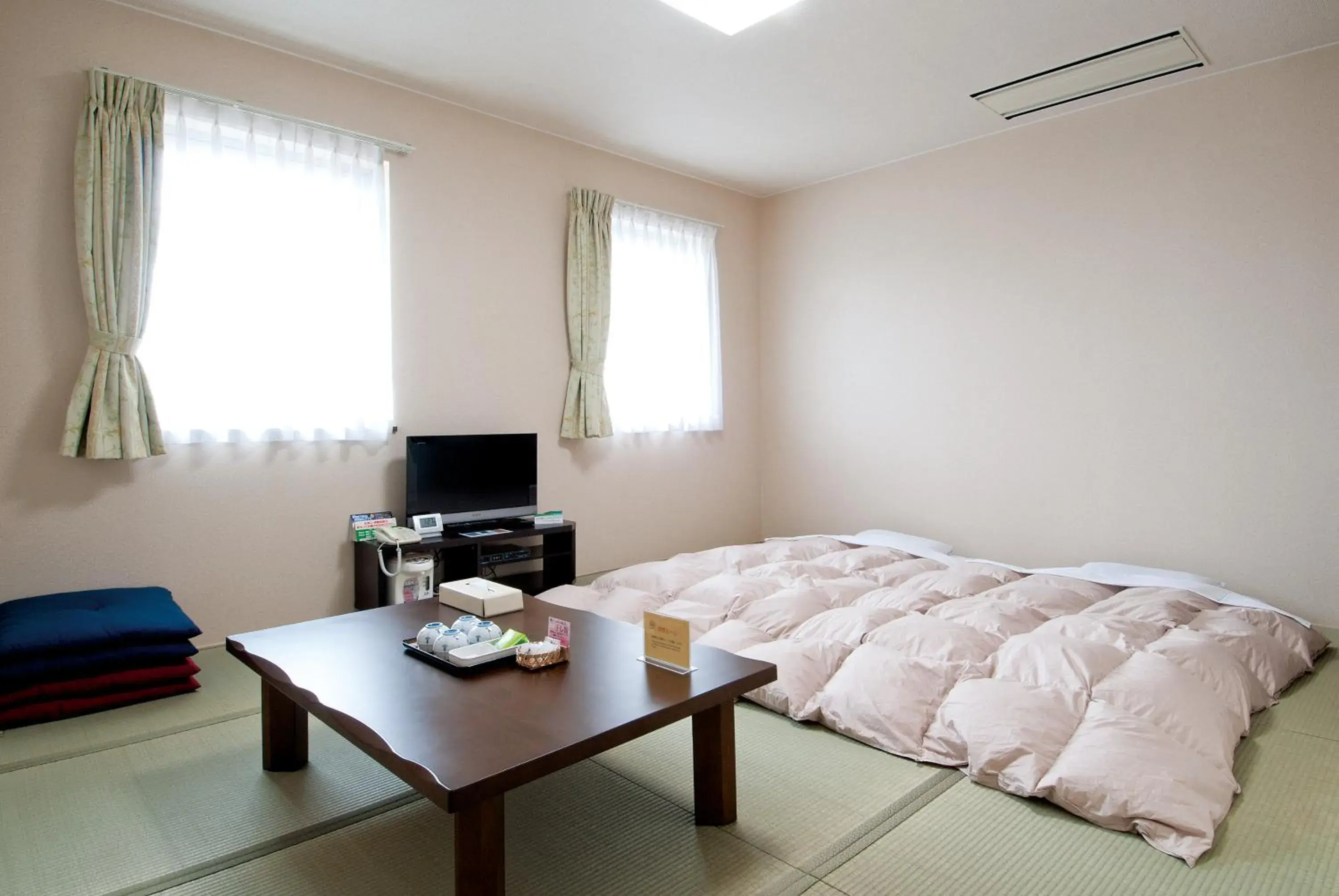 Bed in Hotel New Ohte Bed in Hotel New Ohte