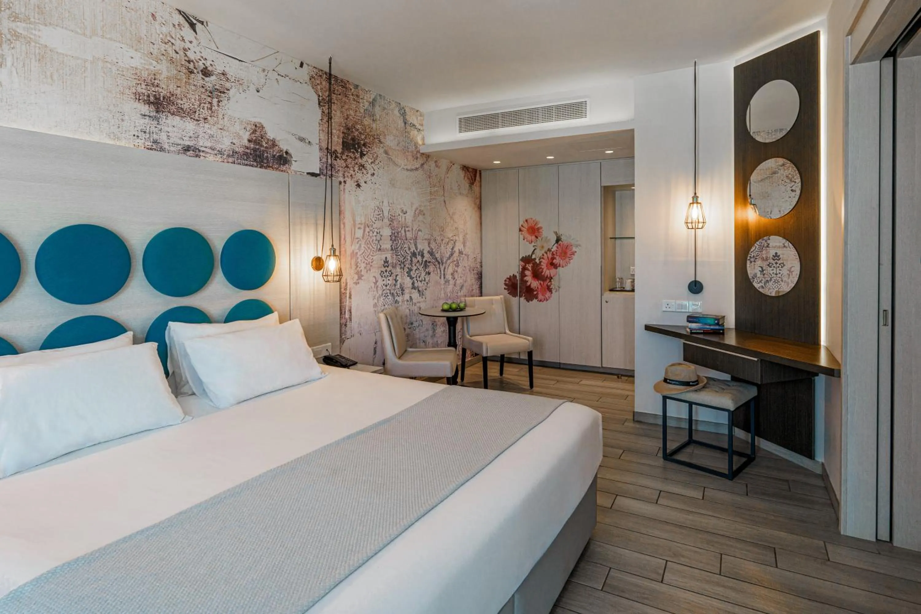 Bed in Vangelis Hotel & Suites