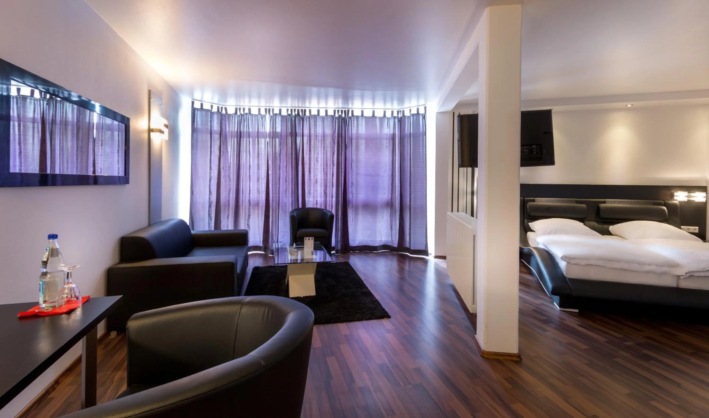 Photo of the whole room, Bed in Turmhotel Rhein-Main