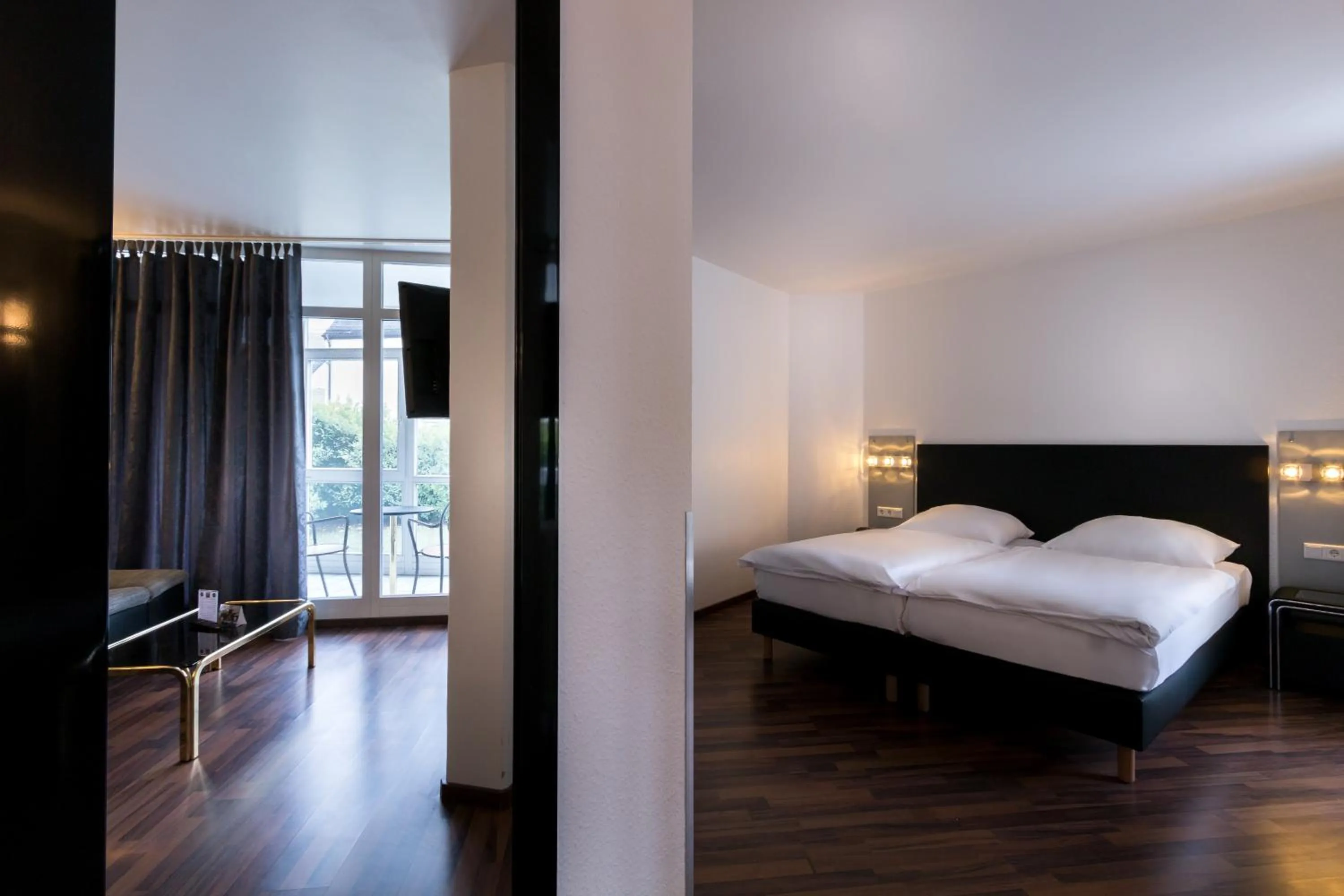 Photo of the whole room, Bed in Turmhotel Rhein-Main