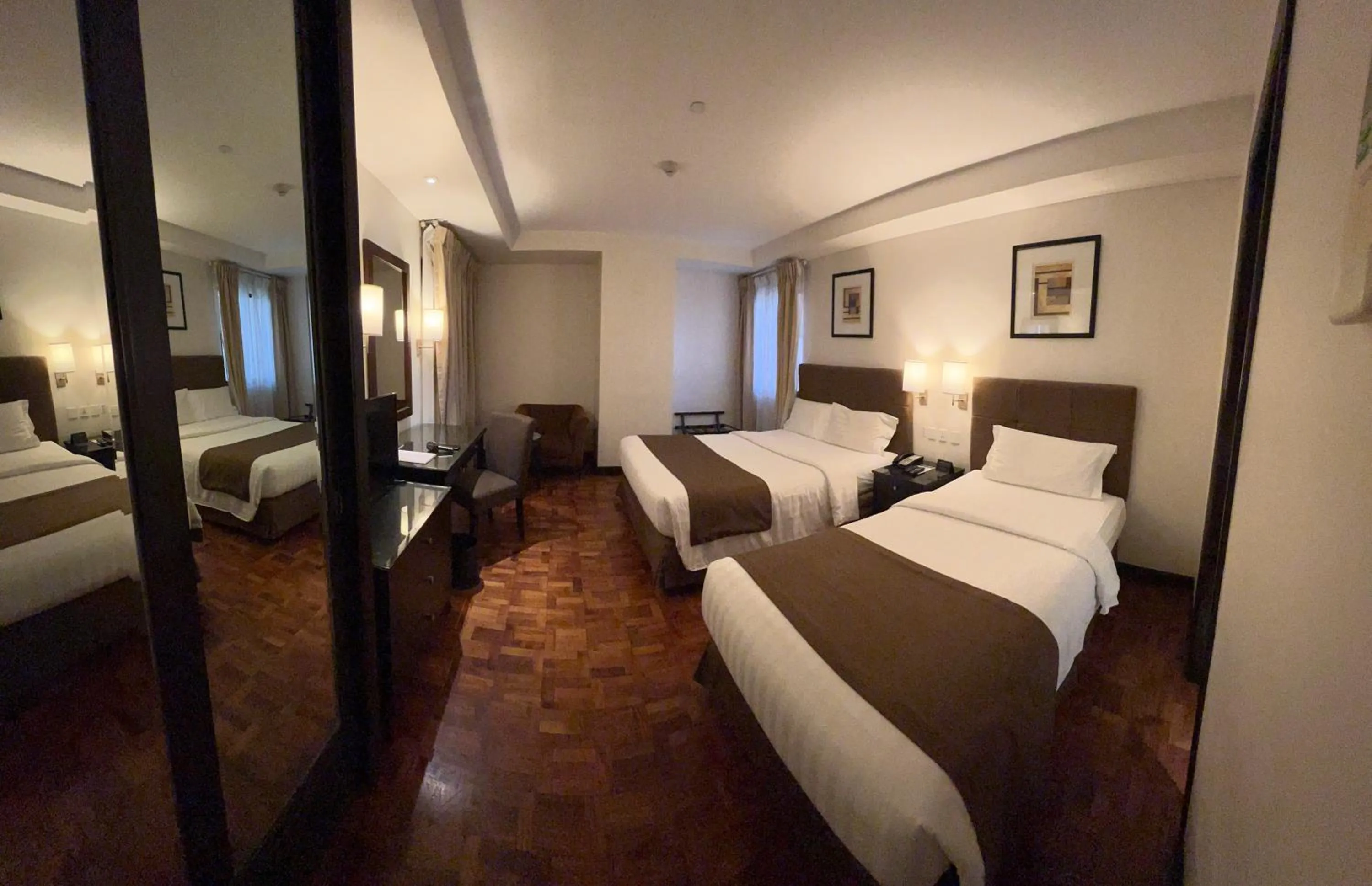 Bed in City Garden Hotel Makati