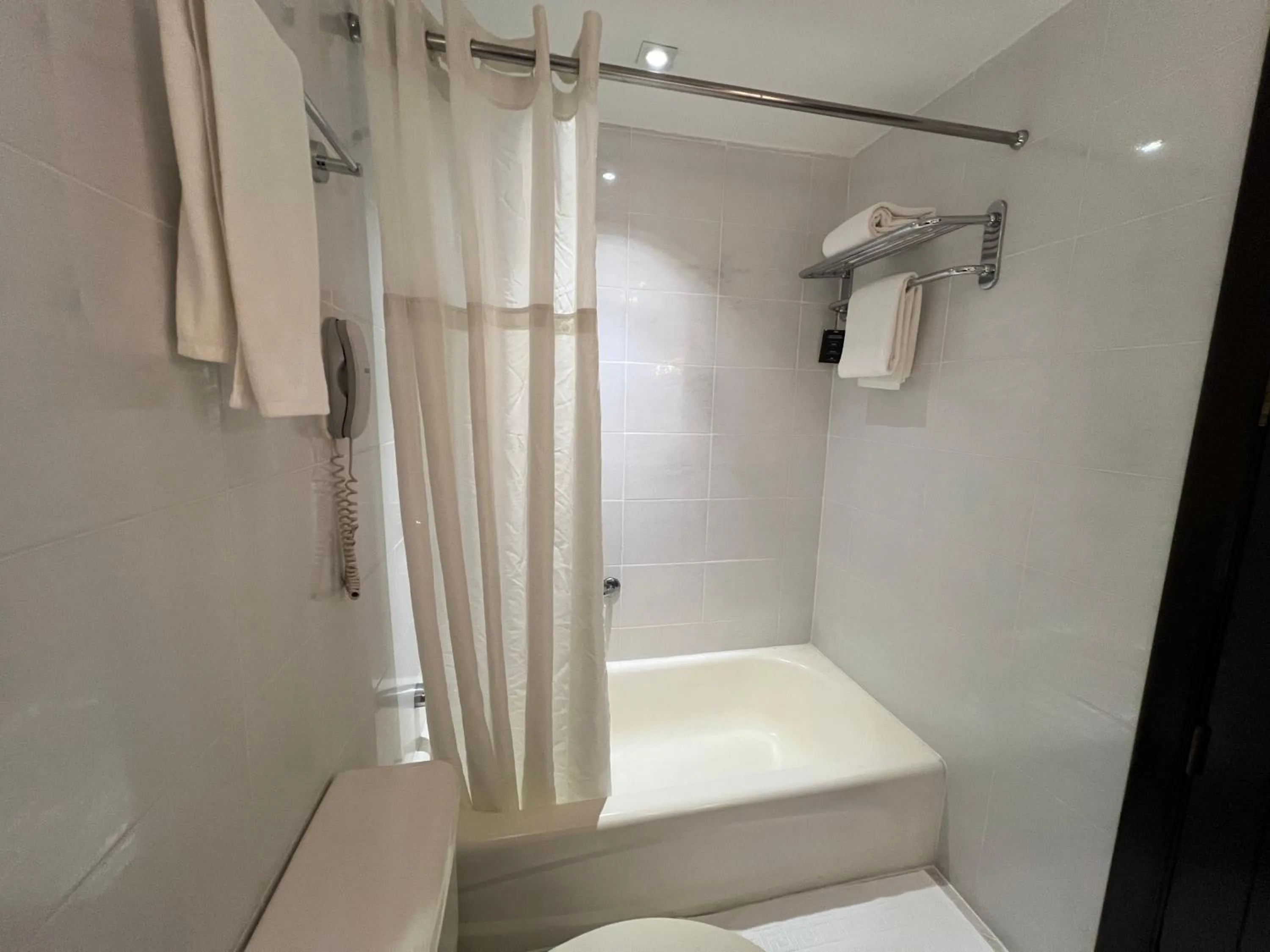 Bed in City Garden Hotel Makati