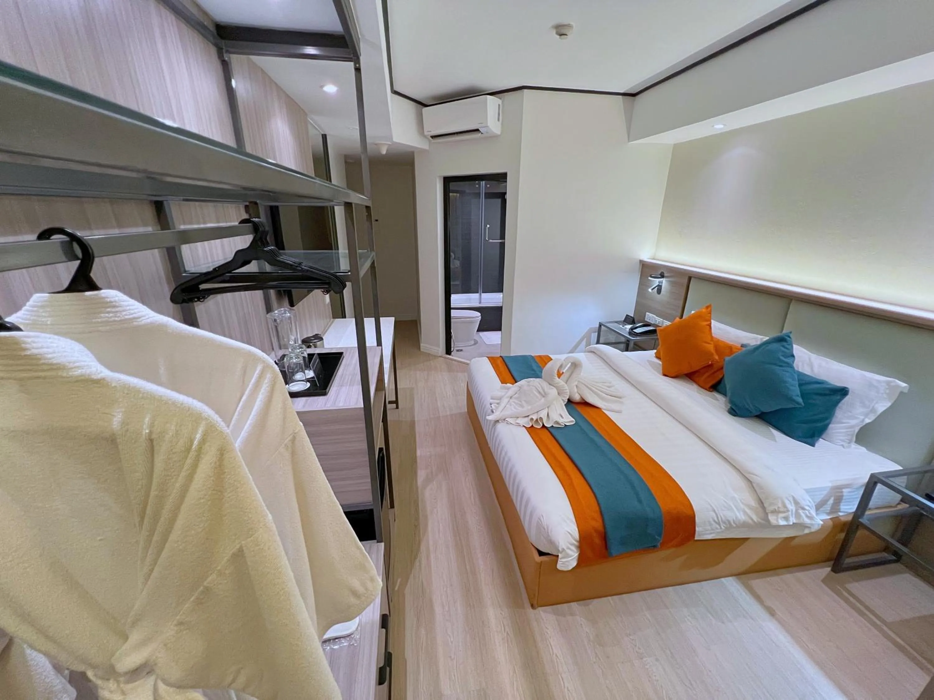 Bed in City Garden Hotel Makati