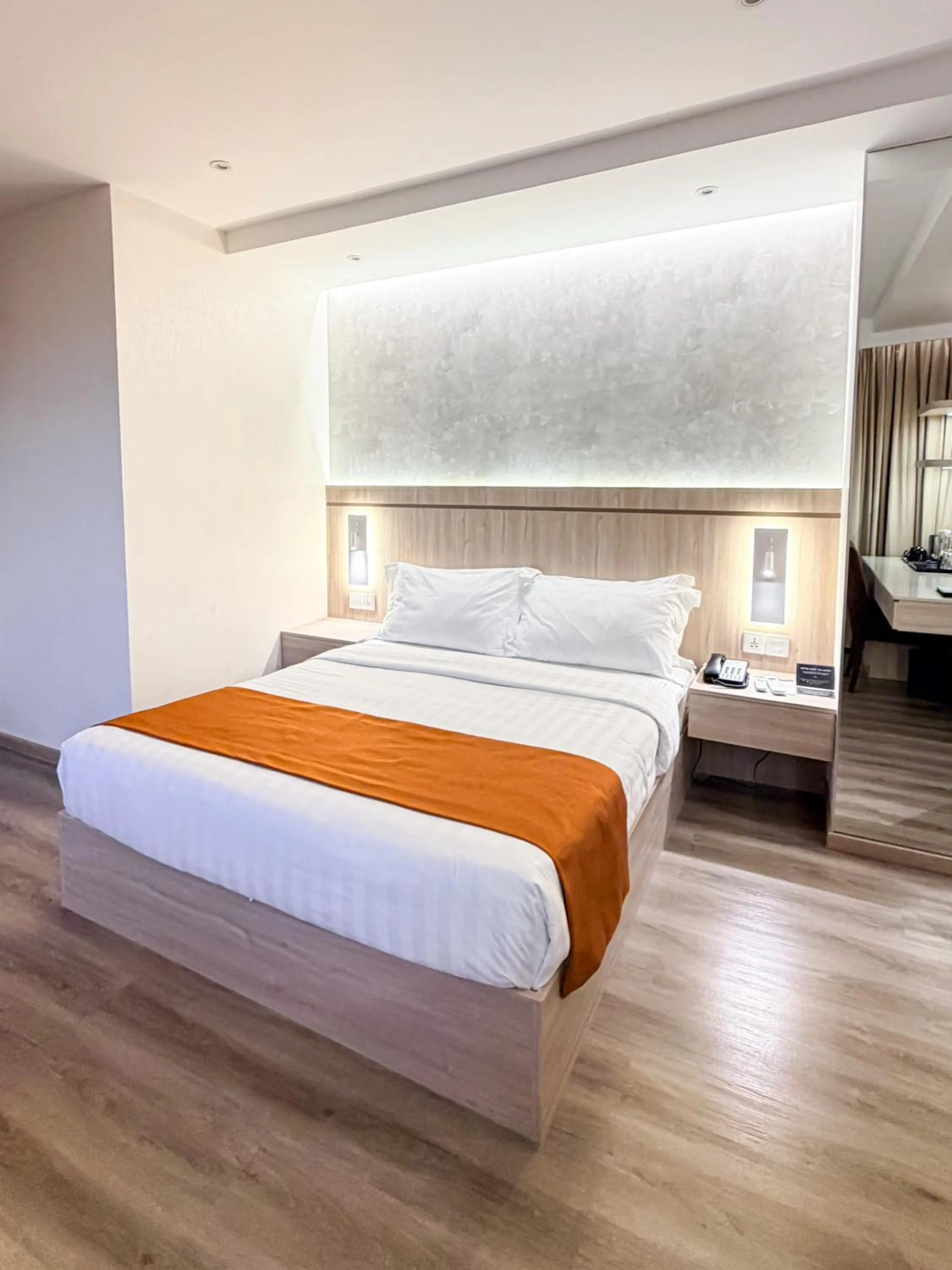 Bed in City Garden Hotel Makati