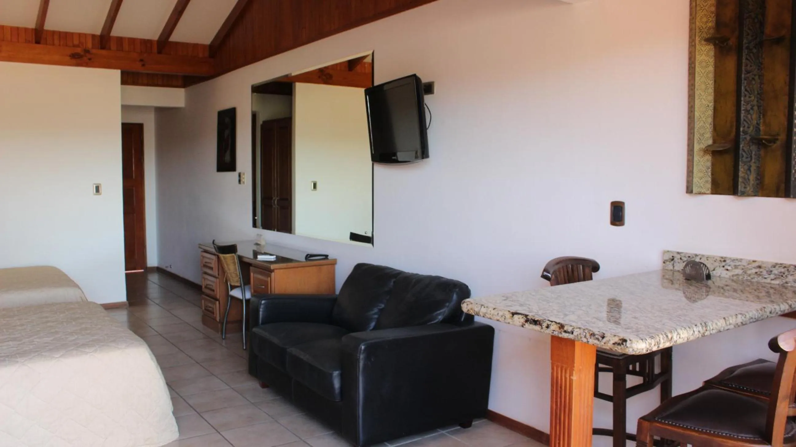 Seating area, Bed in Flamingo Marina Hotel