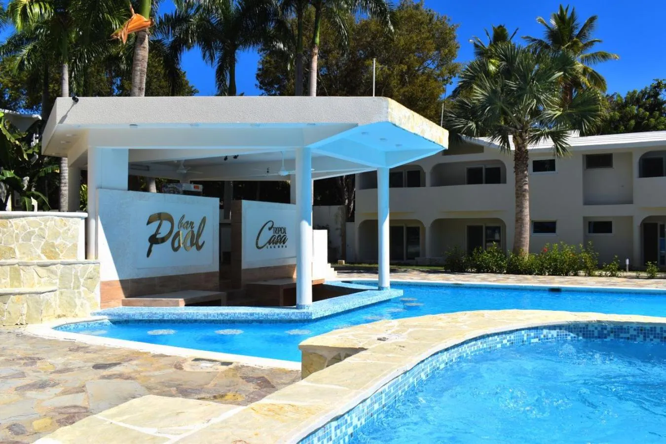 Property logo or sign in Tropical Casa Laguna