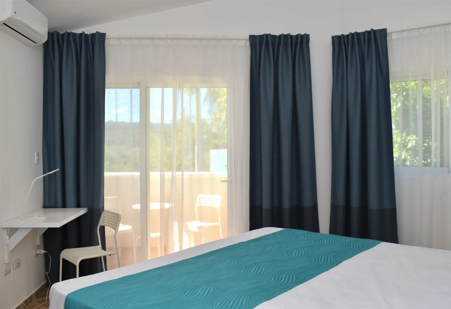 Patio, Bed in Tropical Casa Laguna