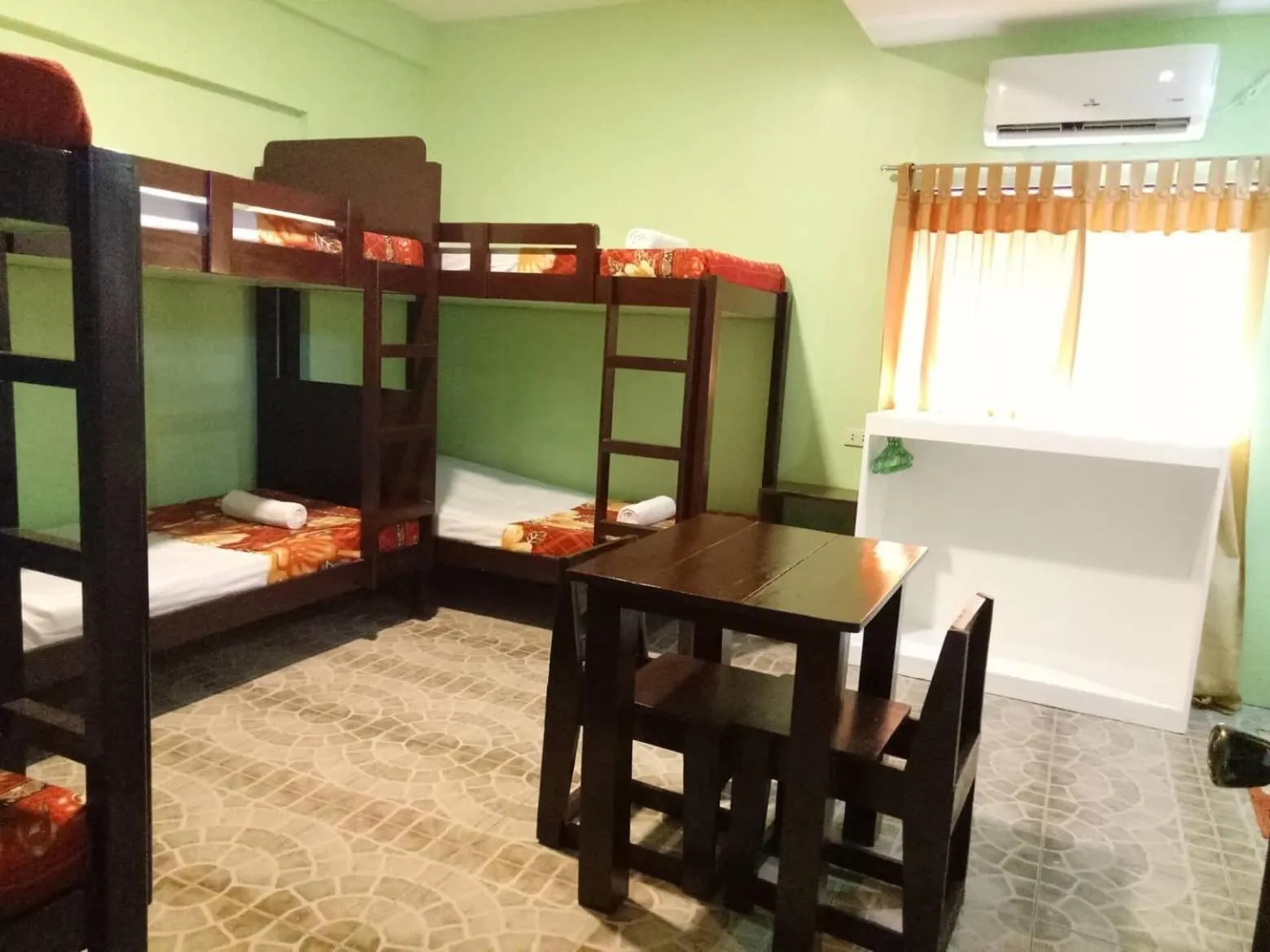 air conditioner, Bed in Antonio's Pension House