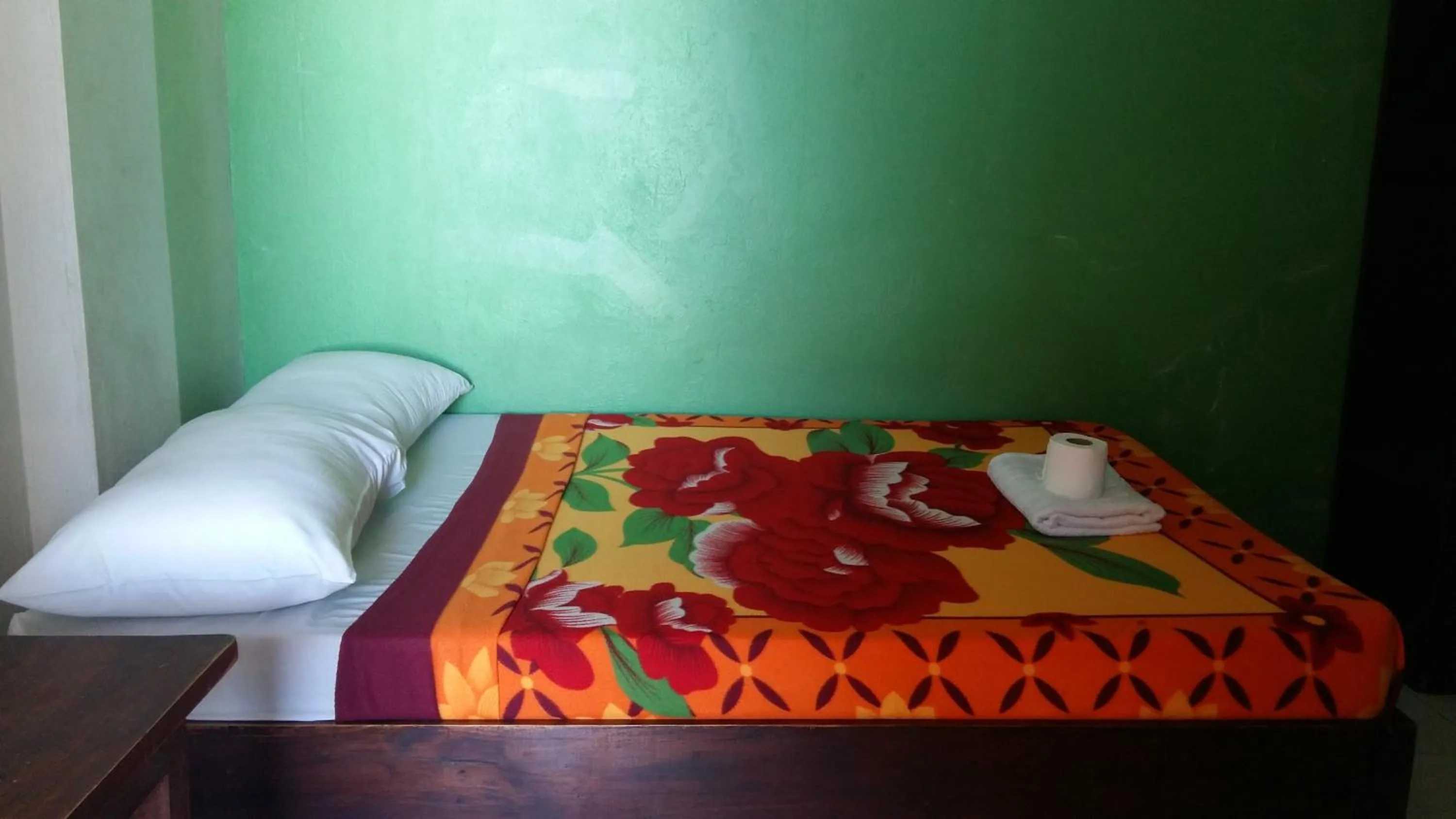 Bed in Antonio's Pension House