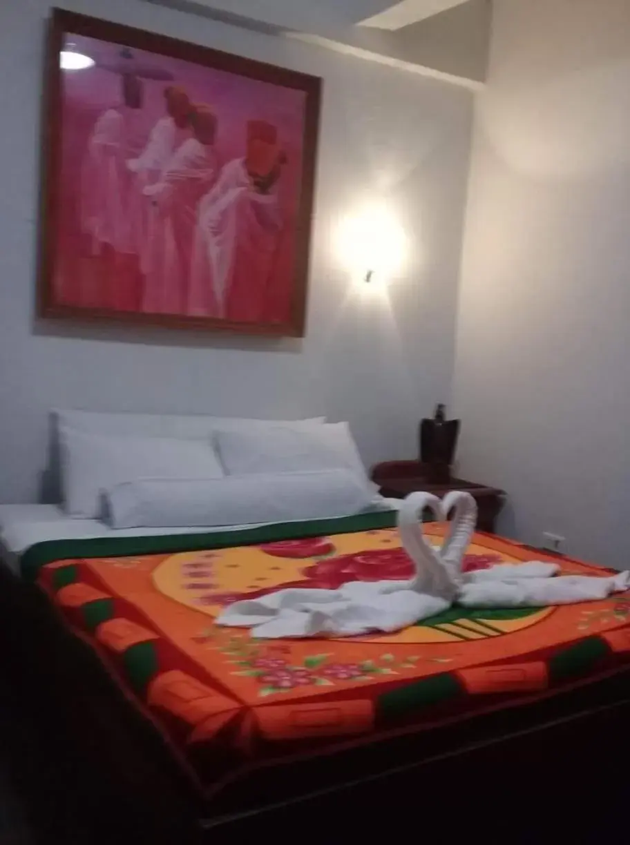 Bed in Antonio's Pension House Bed in Antonio's Pension House