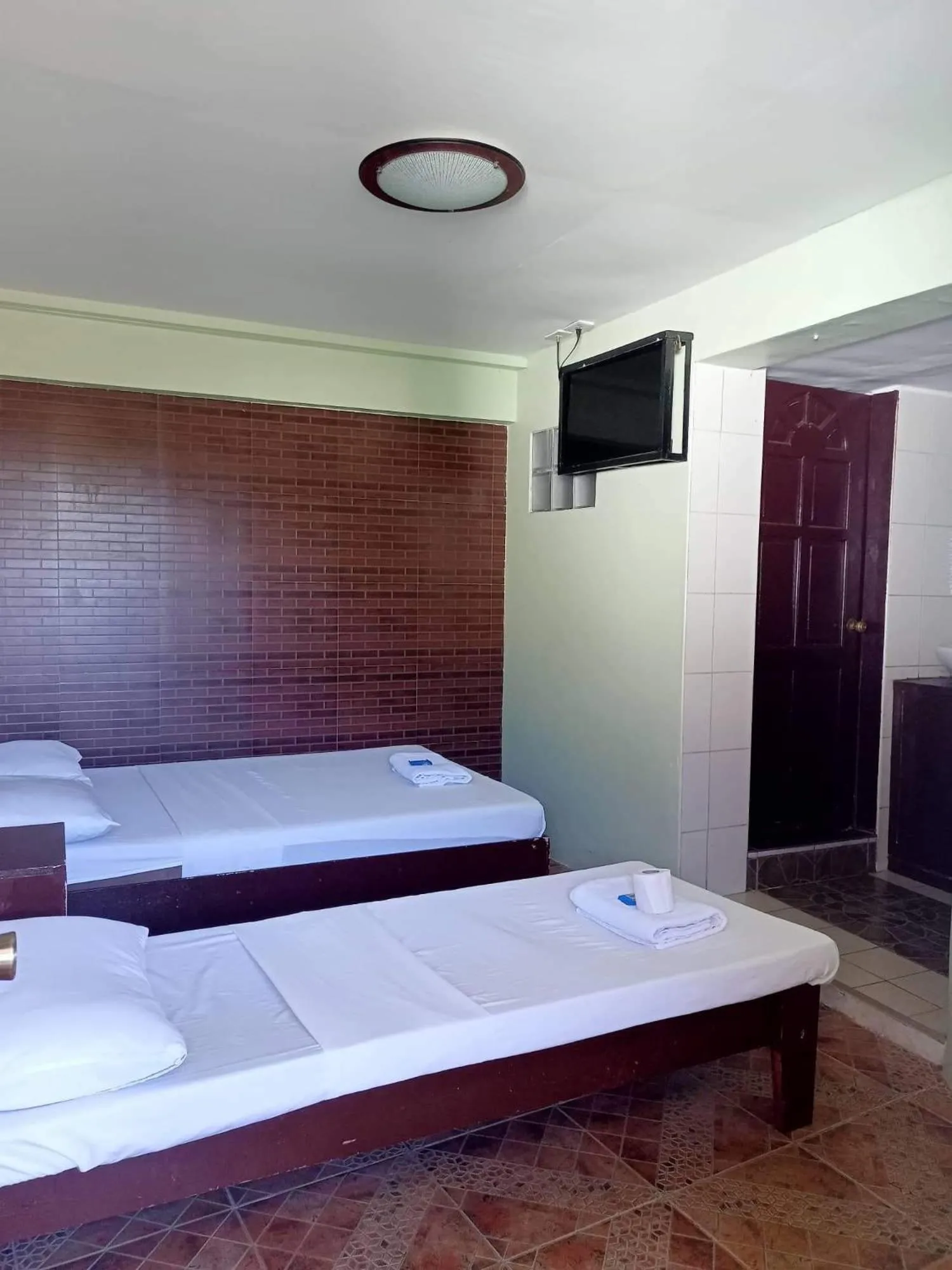 Bed in Antonio's Pension House