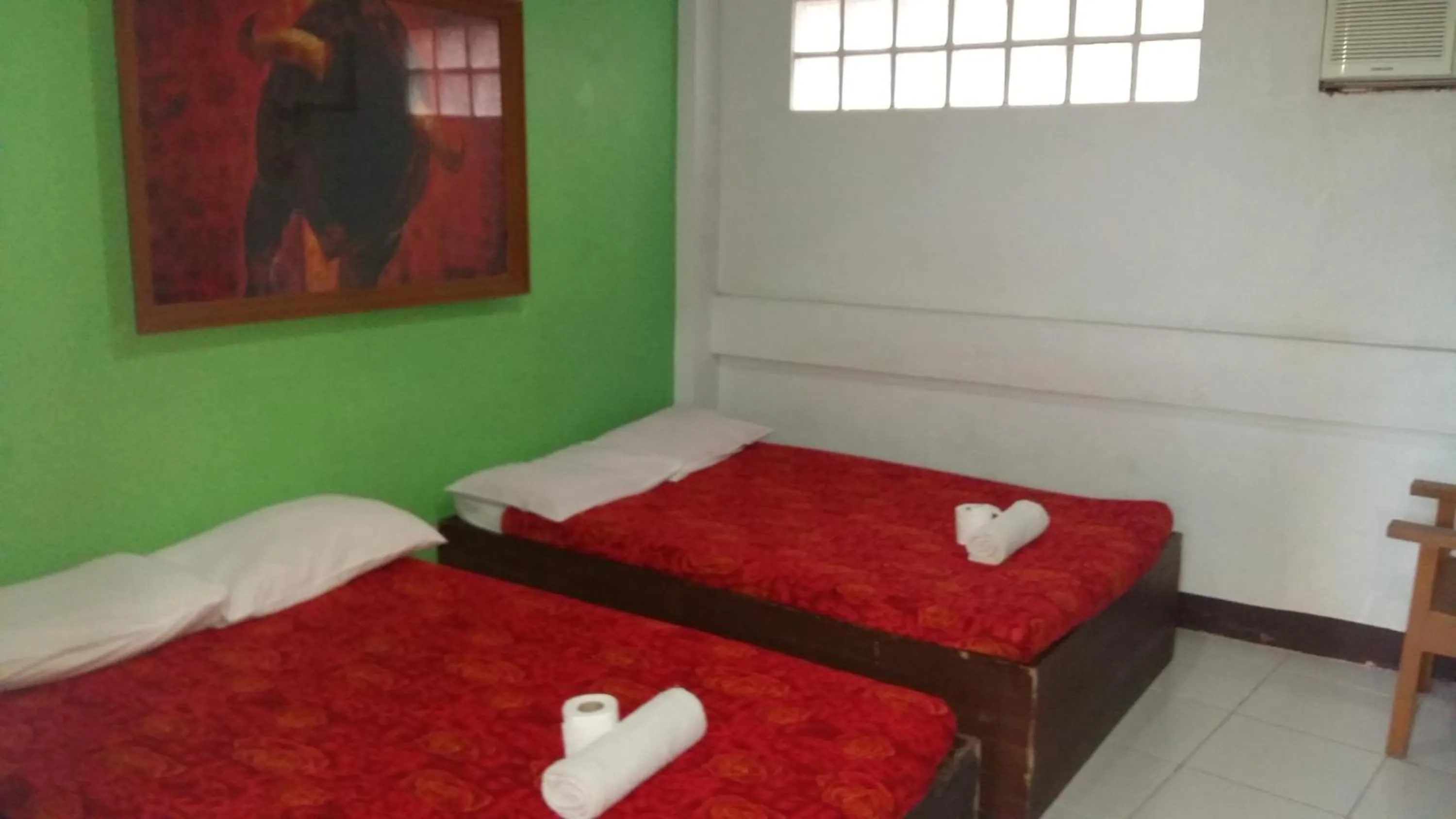 Bed in Antonio's Pension House