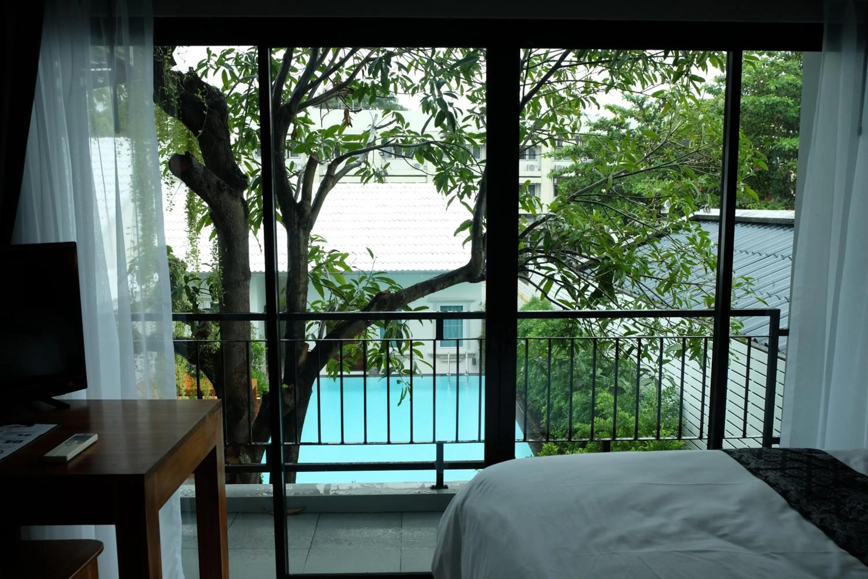 Pool view, Bed in The Besavana Phuket - SHA Extra Plus