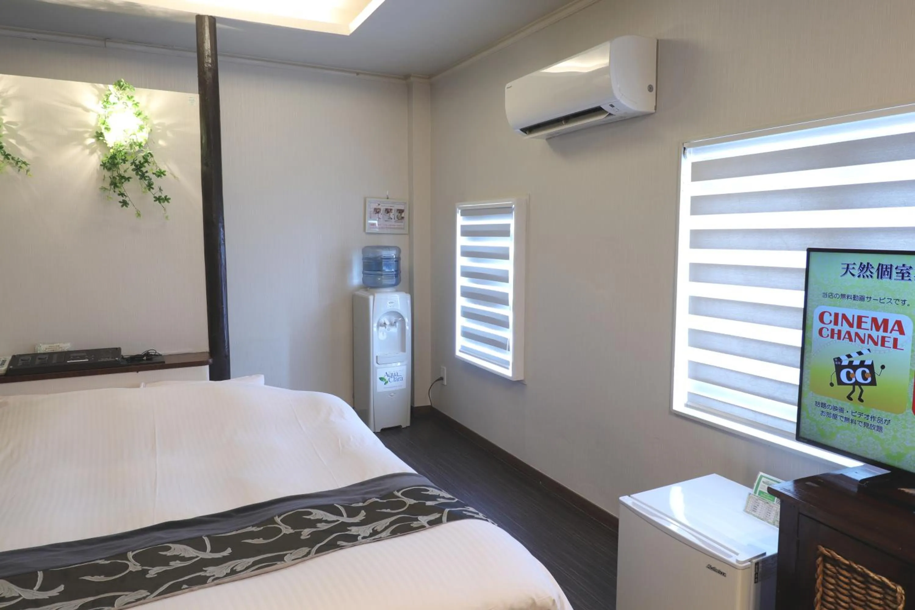 Bed in 天然個室温泉 HOTEL Lafontaine 諏訪