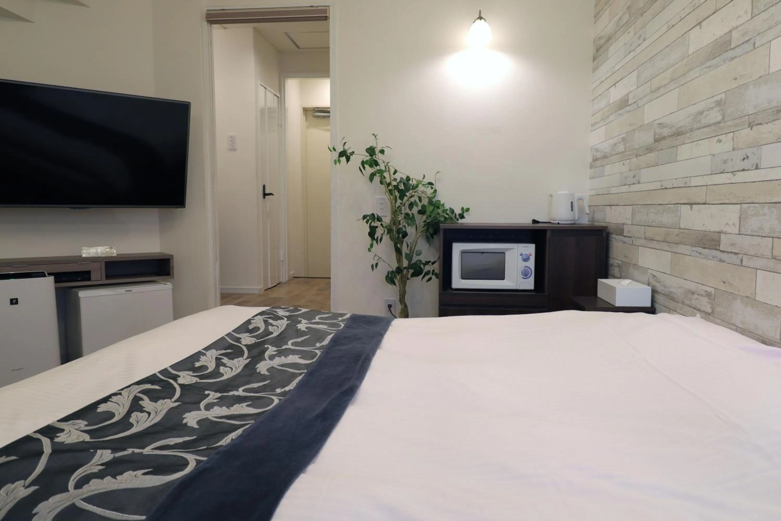 Photo of the whole room, Bed in 天然個室温泉 HOTEL Lafontaine 諏訪