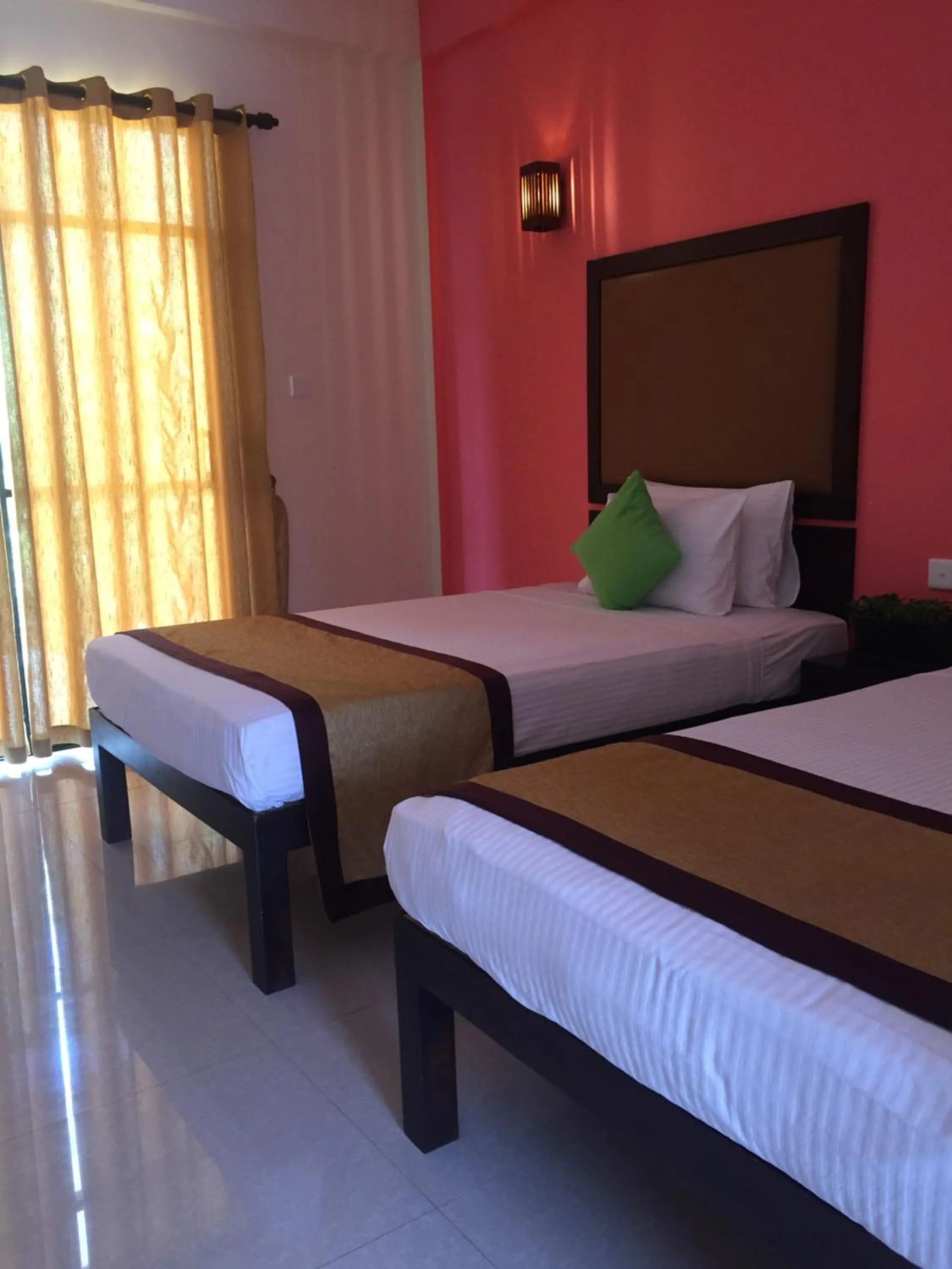 Bed in Organic Garden Resort Sigiriya