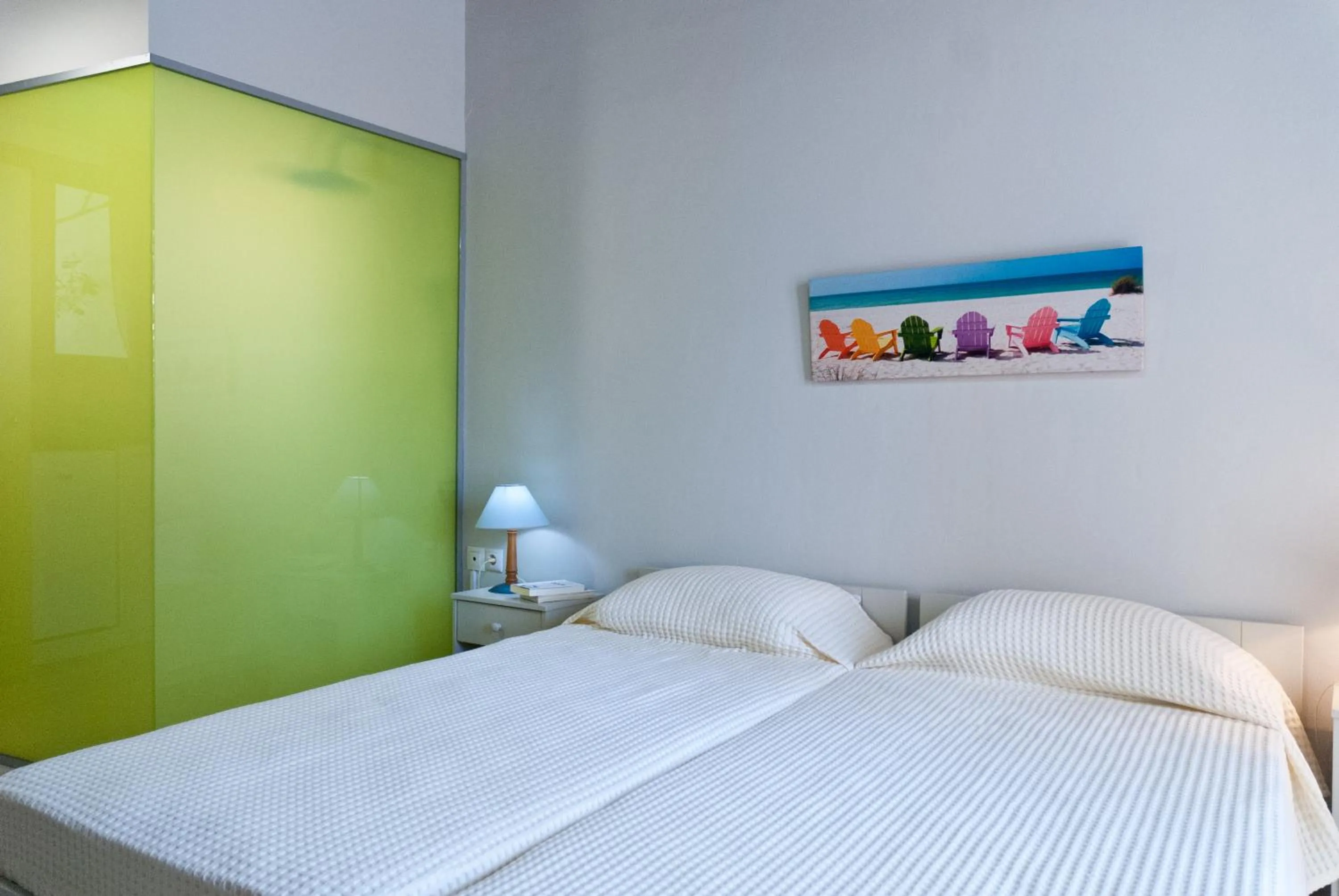 Bed in Magia Apartments