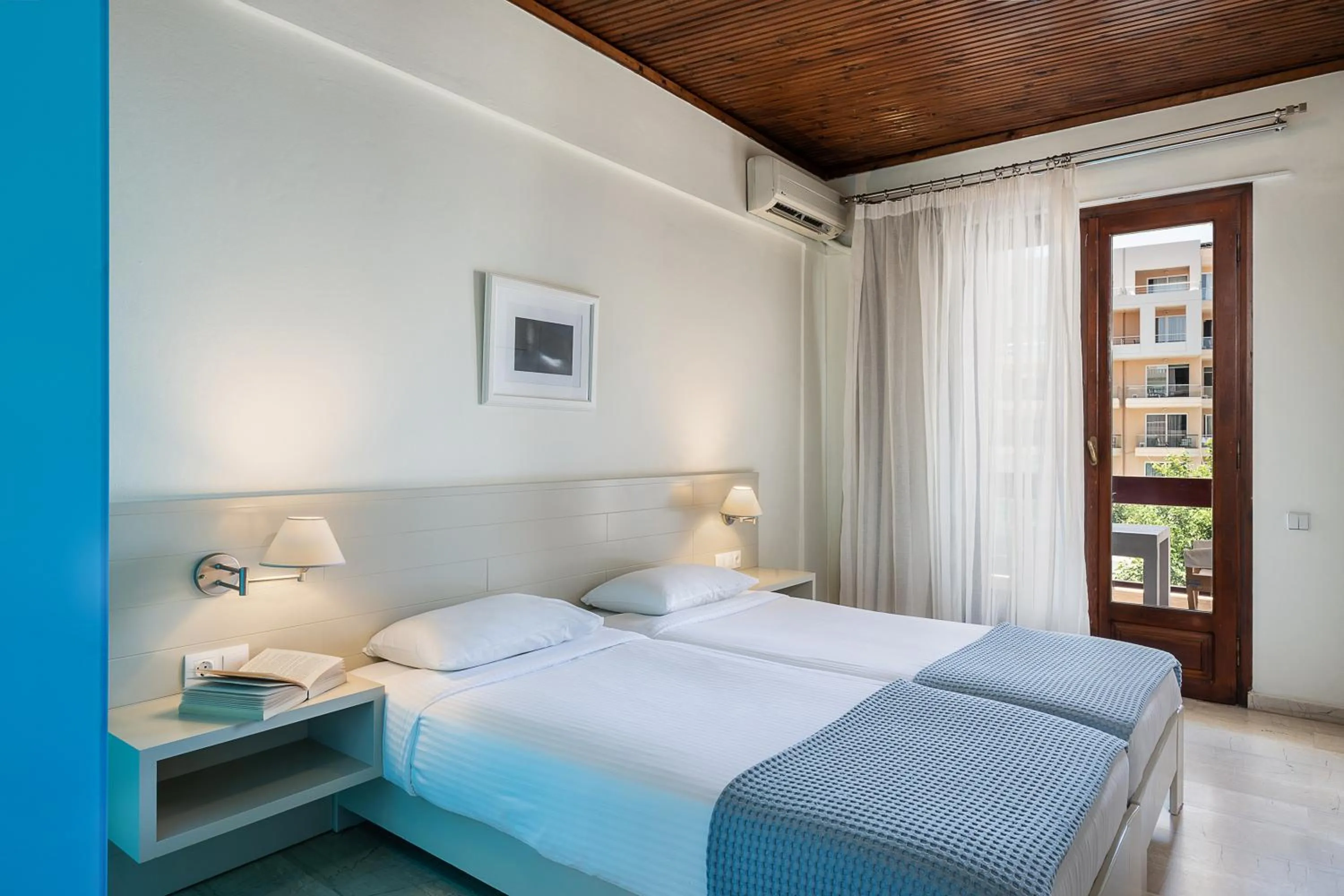 Bed in Magia Apartments