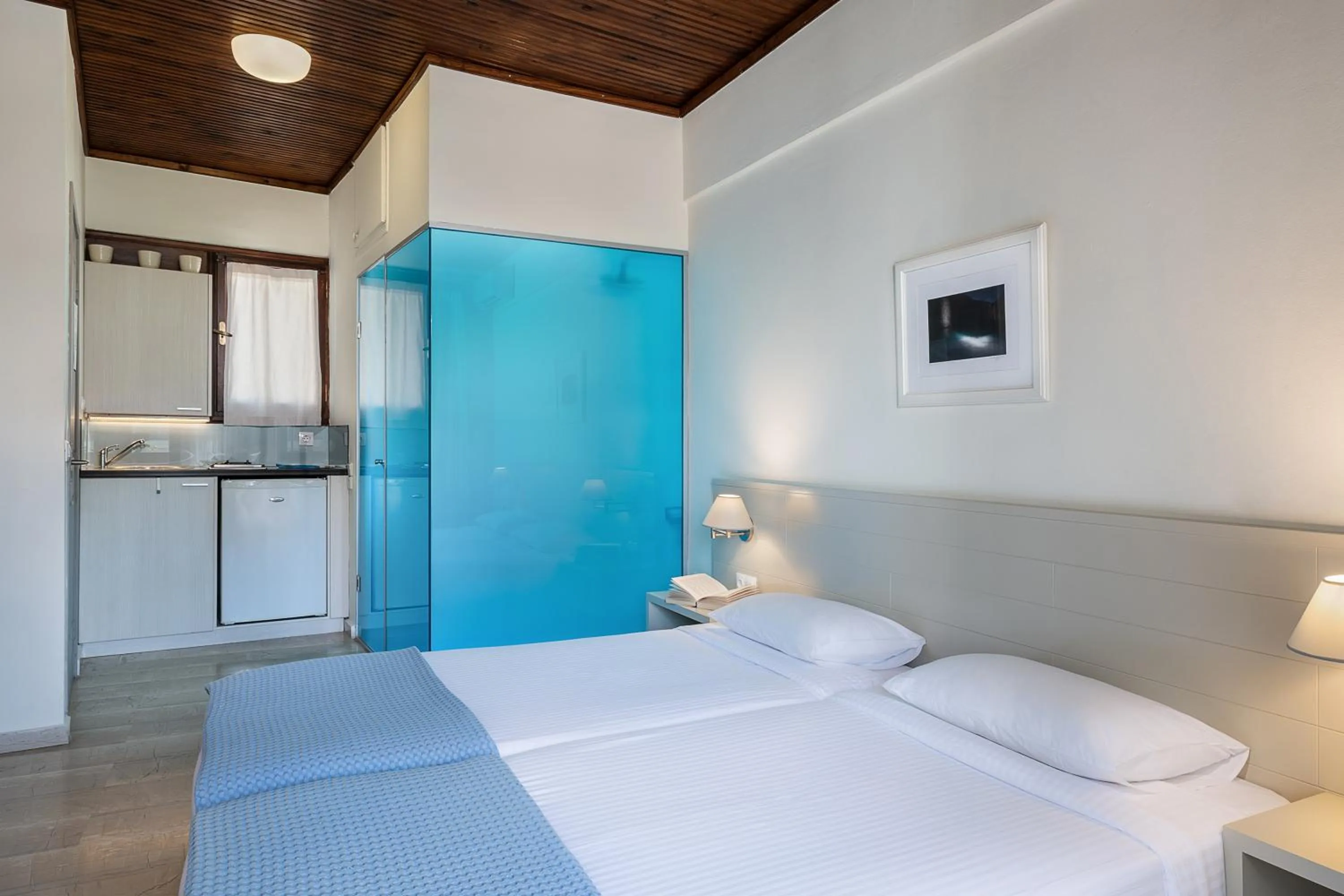 Bed in Magia Apartments