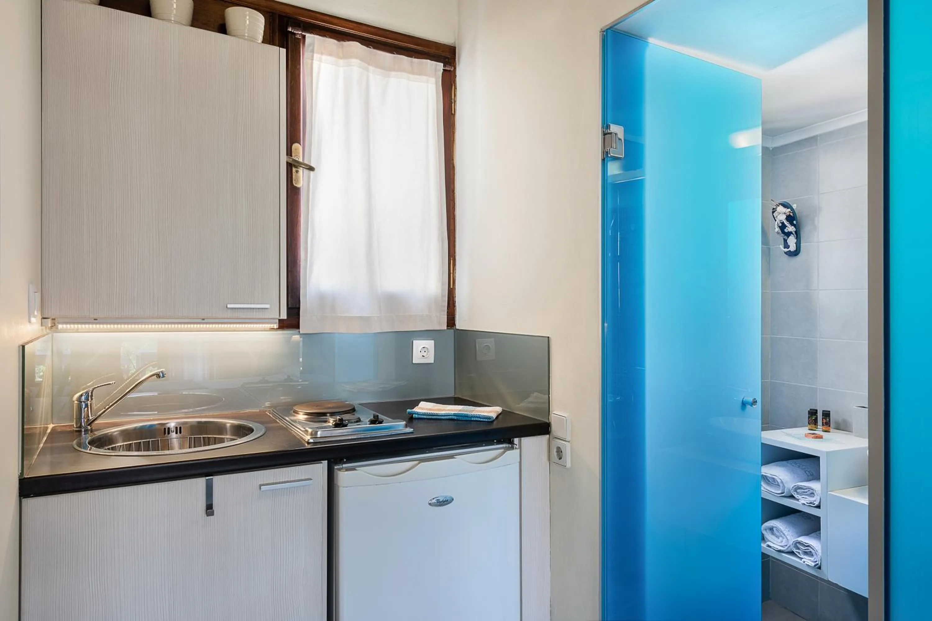 Kitchen or kitchenette in Magia Apartments