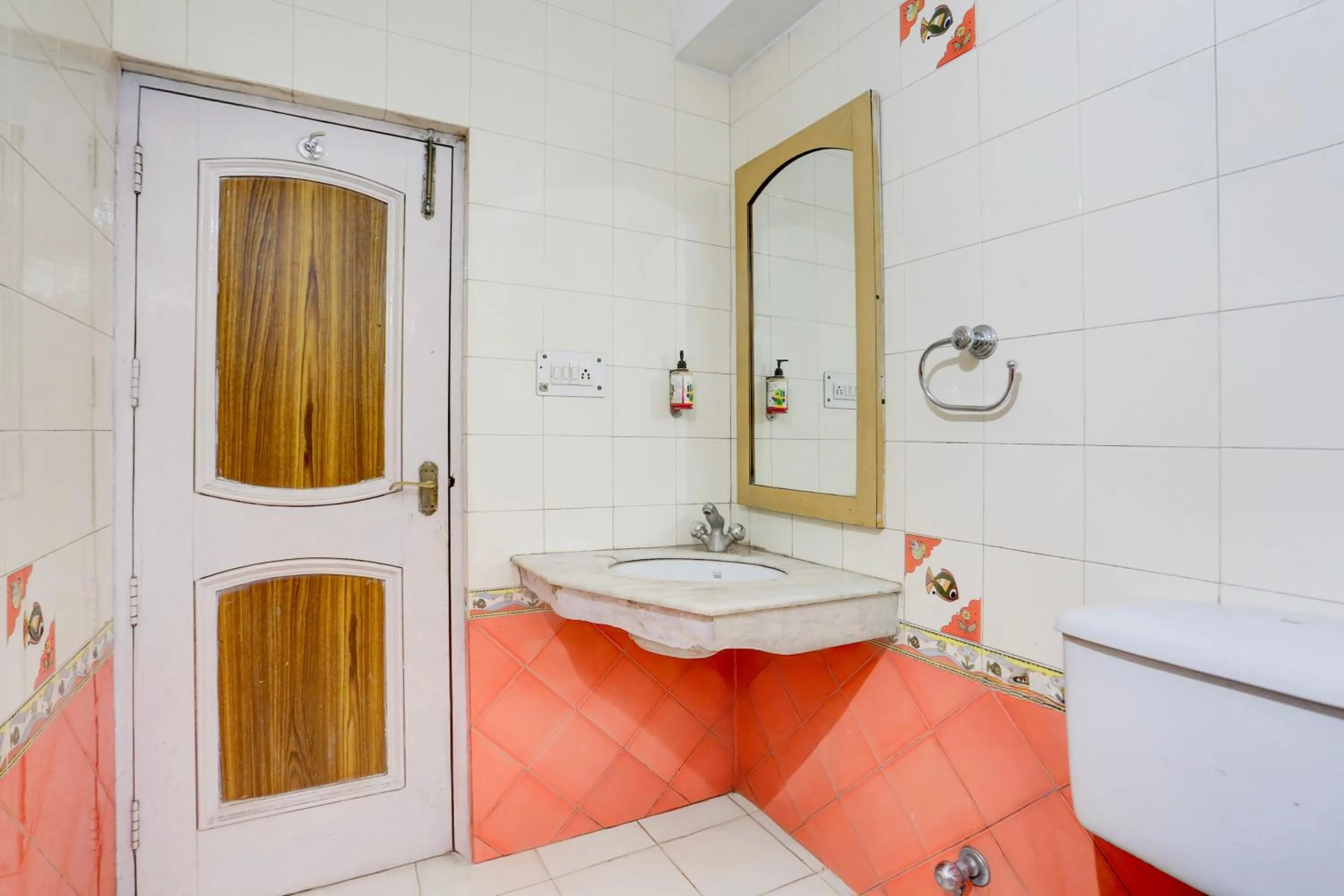 Bathroom in Super Collection O Mall Road Formerly Hotel Shubham
