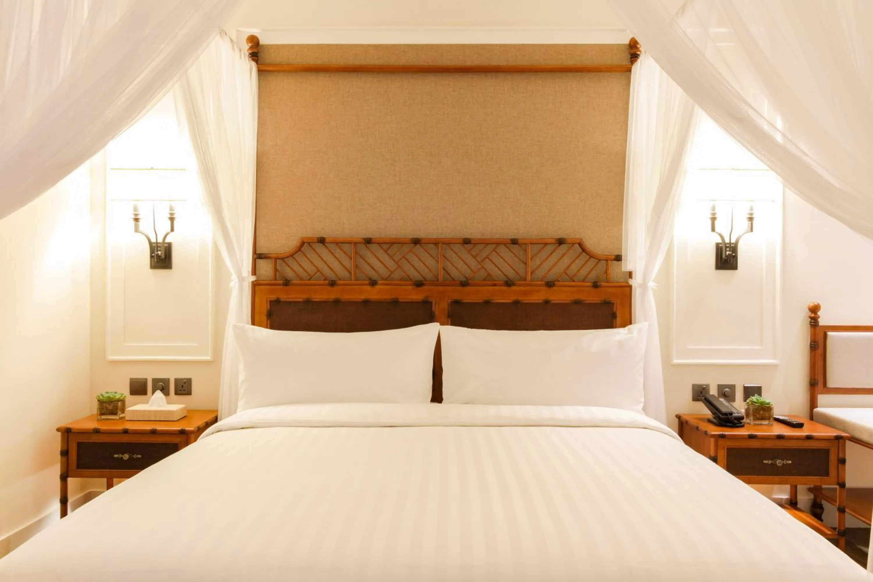 Bed in Feliz Hotel Boracay