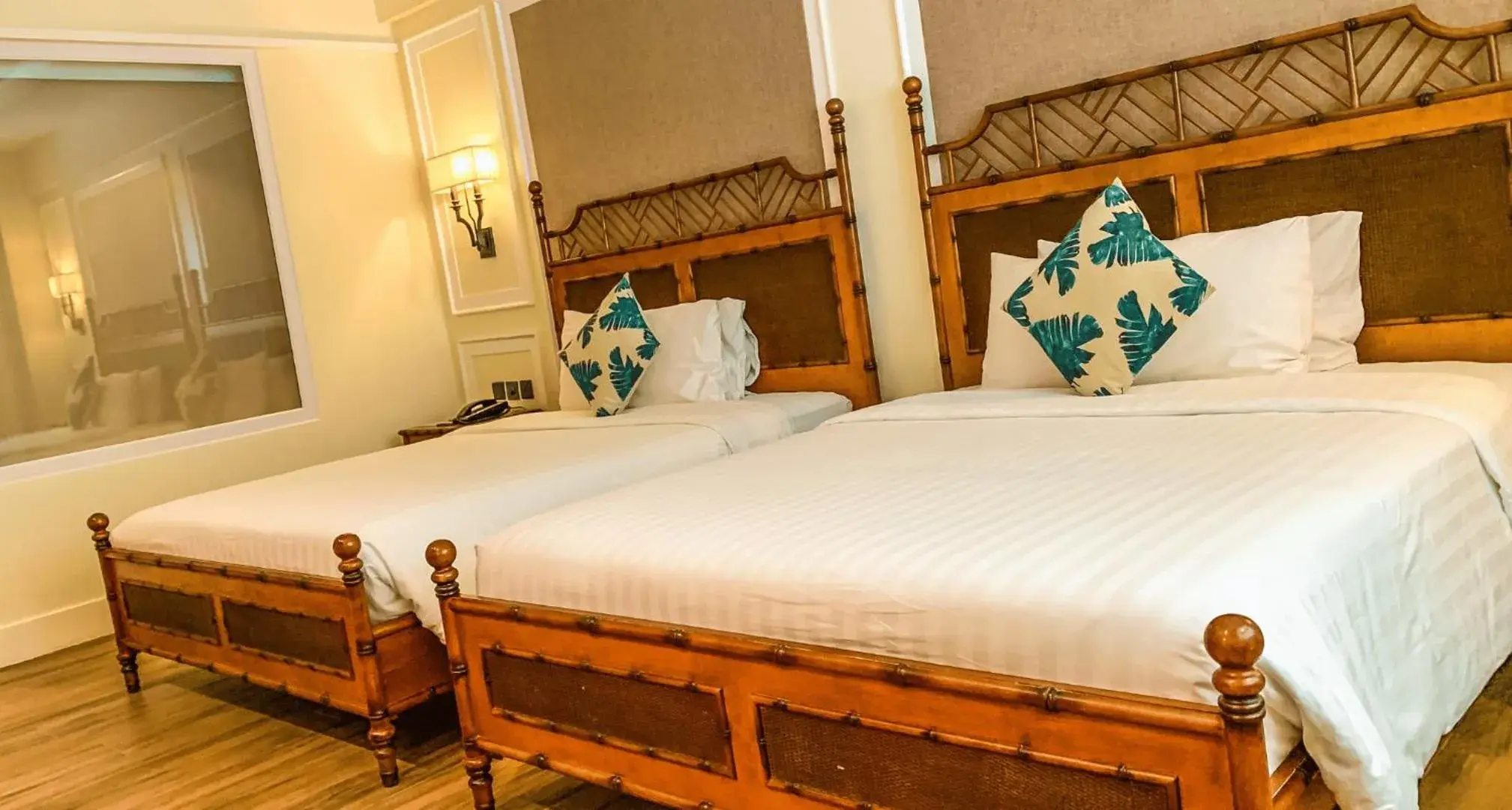 Bed in Feliz Hotel Boracay Bed in Feliz Hotel Boracay