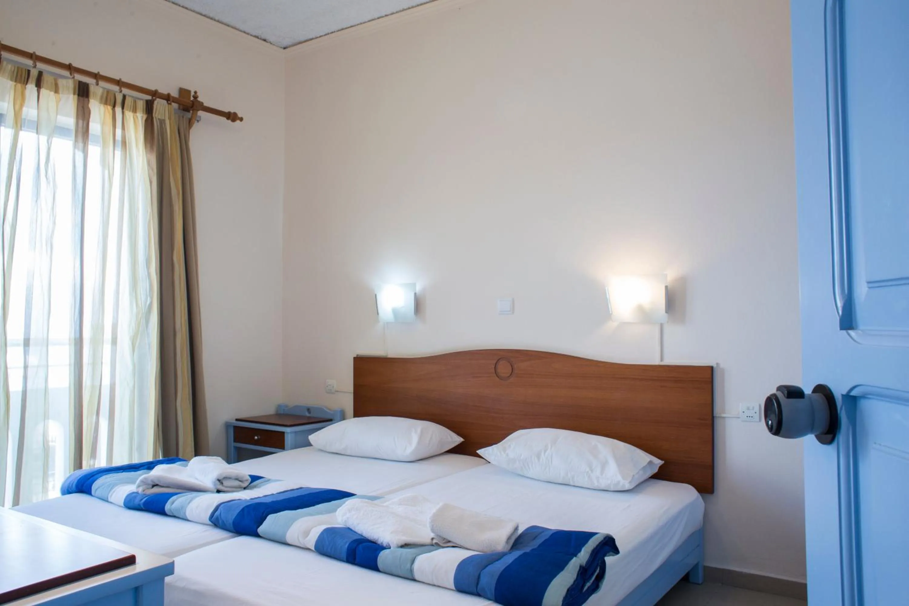 Bedroom in Mandy Suites