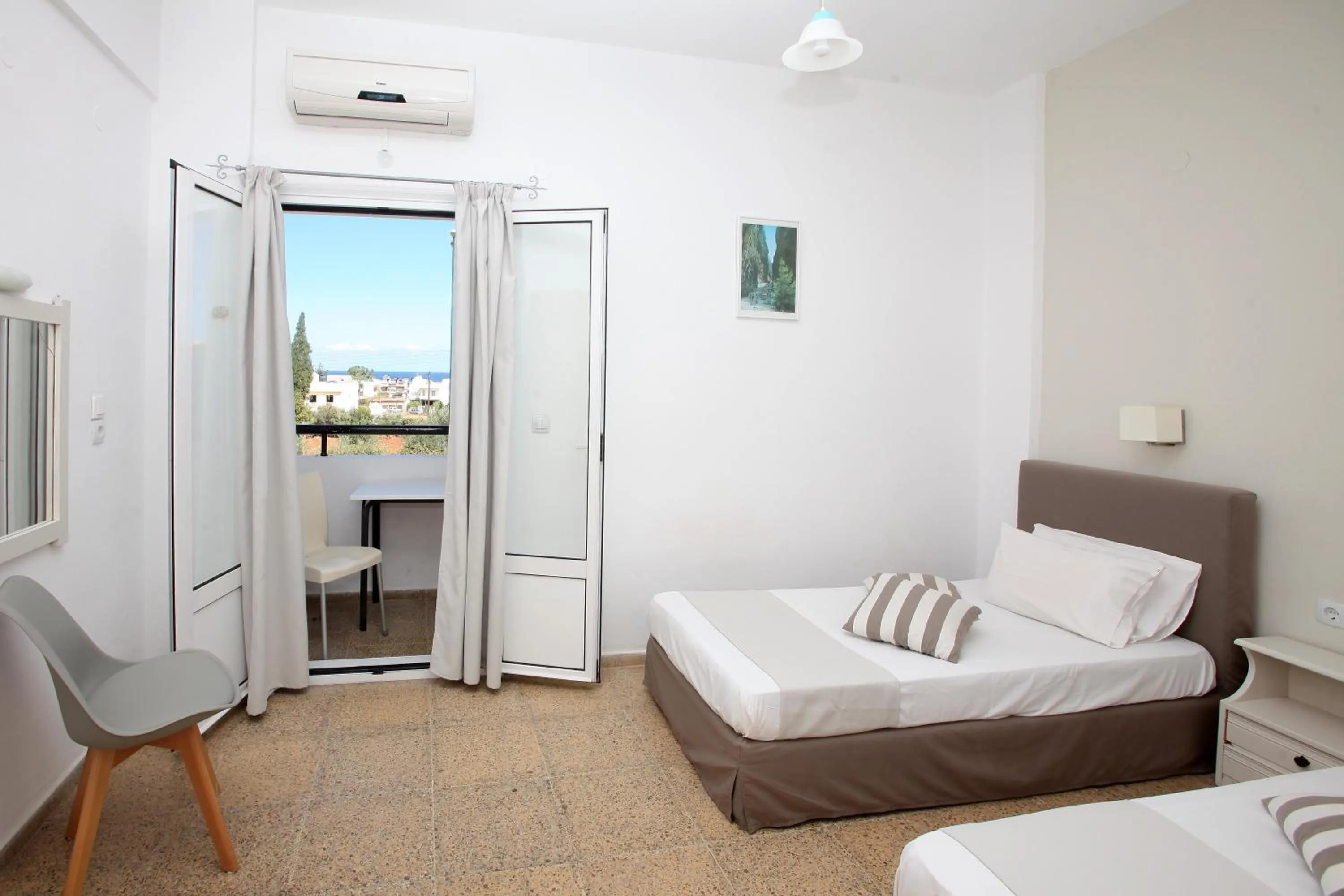 Bed in Iraklis Apartments