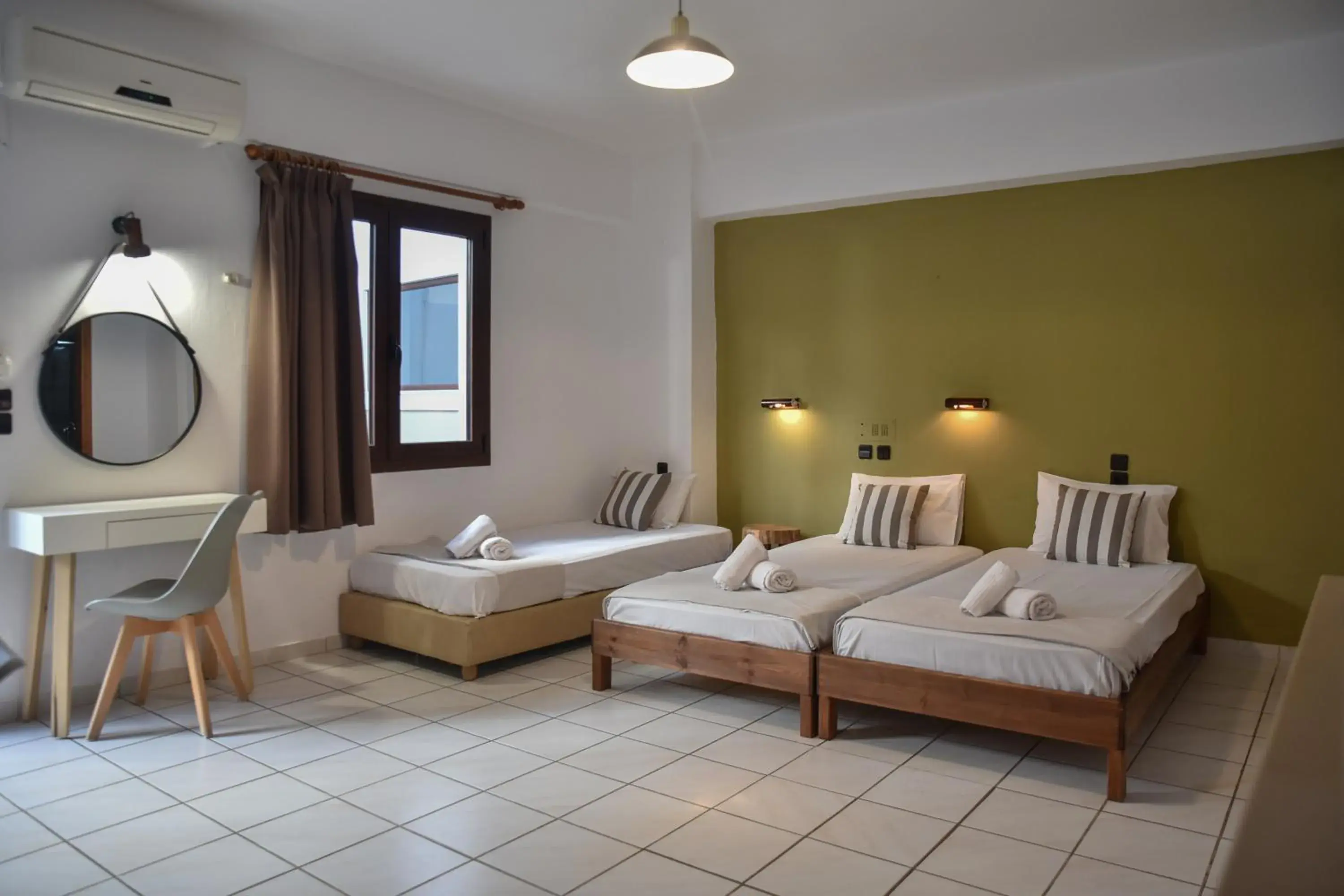 Bed in Iraklis Apartments Bed in Iraklis Apartments