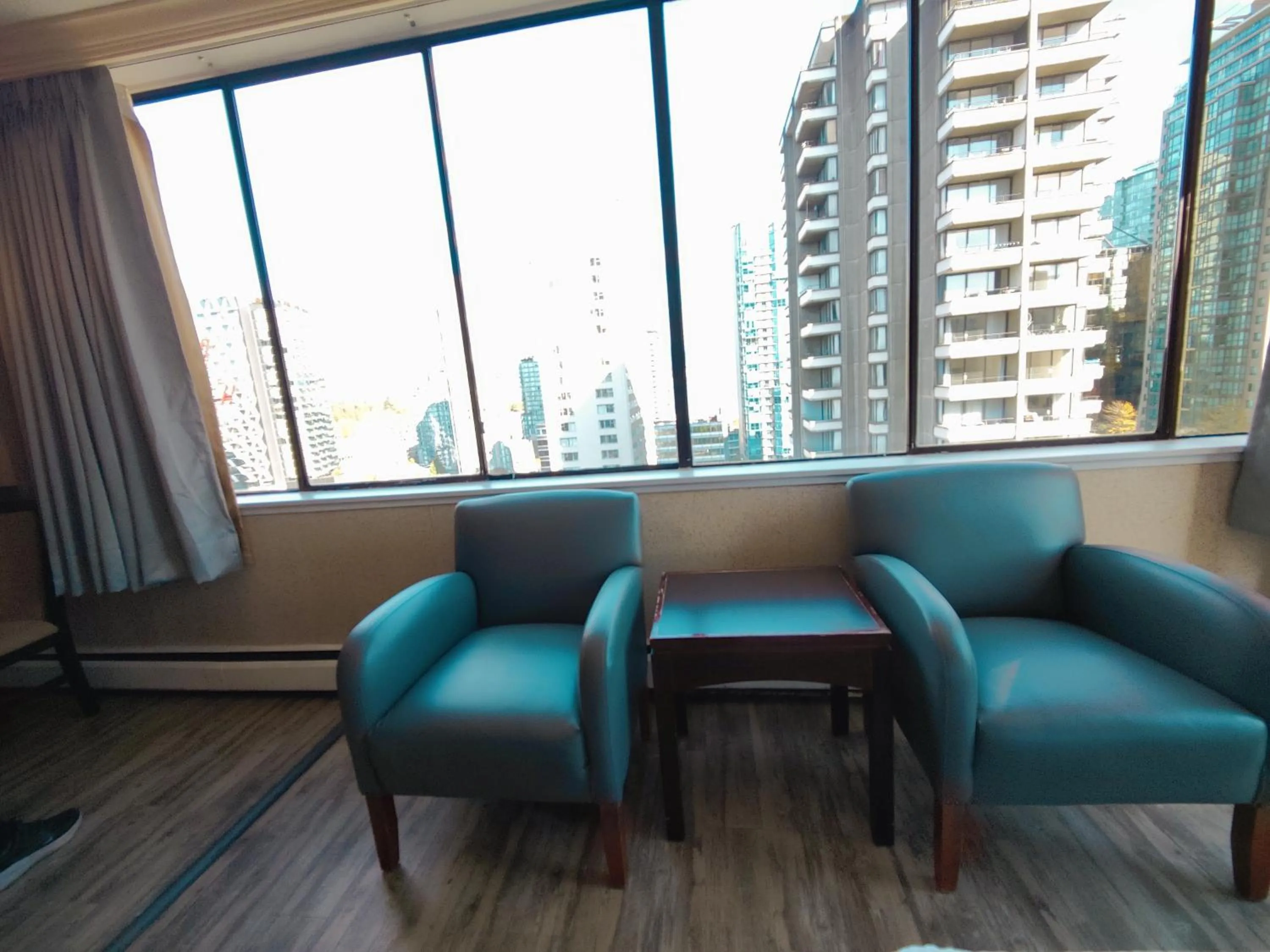 Seating area in Divya Sutra Suites on Robson Downtown Vancouver