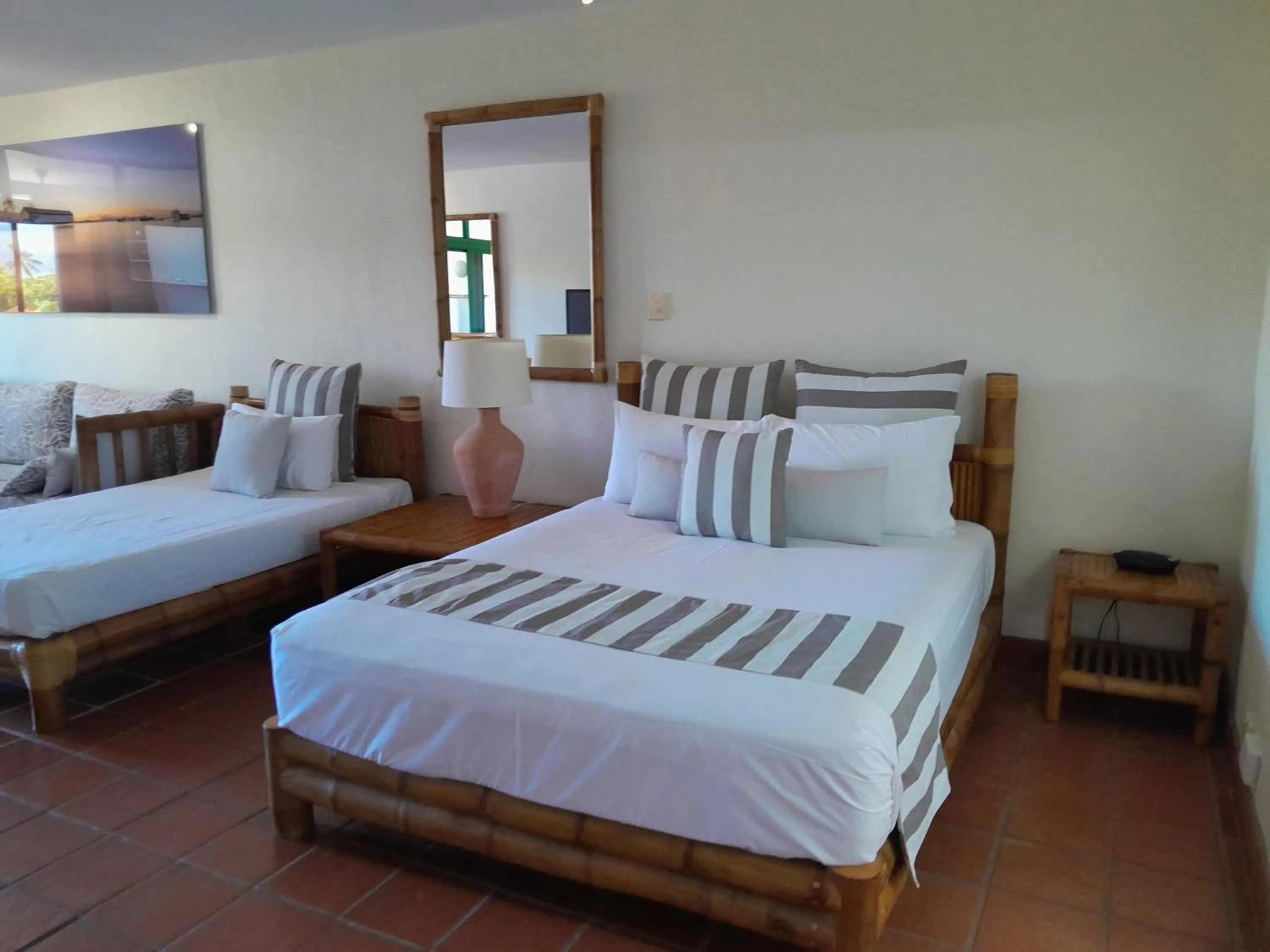 Bed in Club Tropical Resort - Official Onsite Reception & Check In