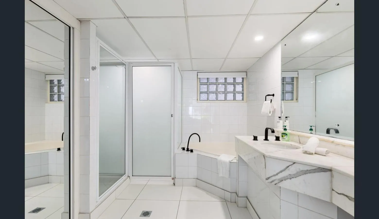 Shower in Club Tropical Resort - Official Onsite Reception & Check In