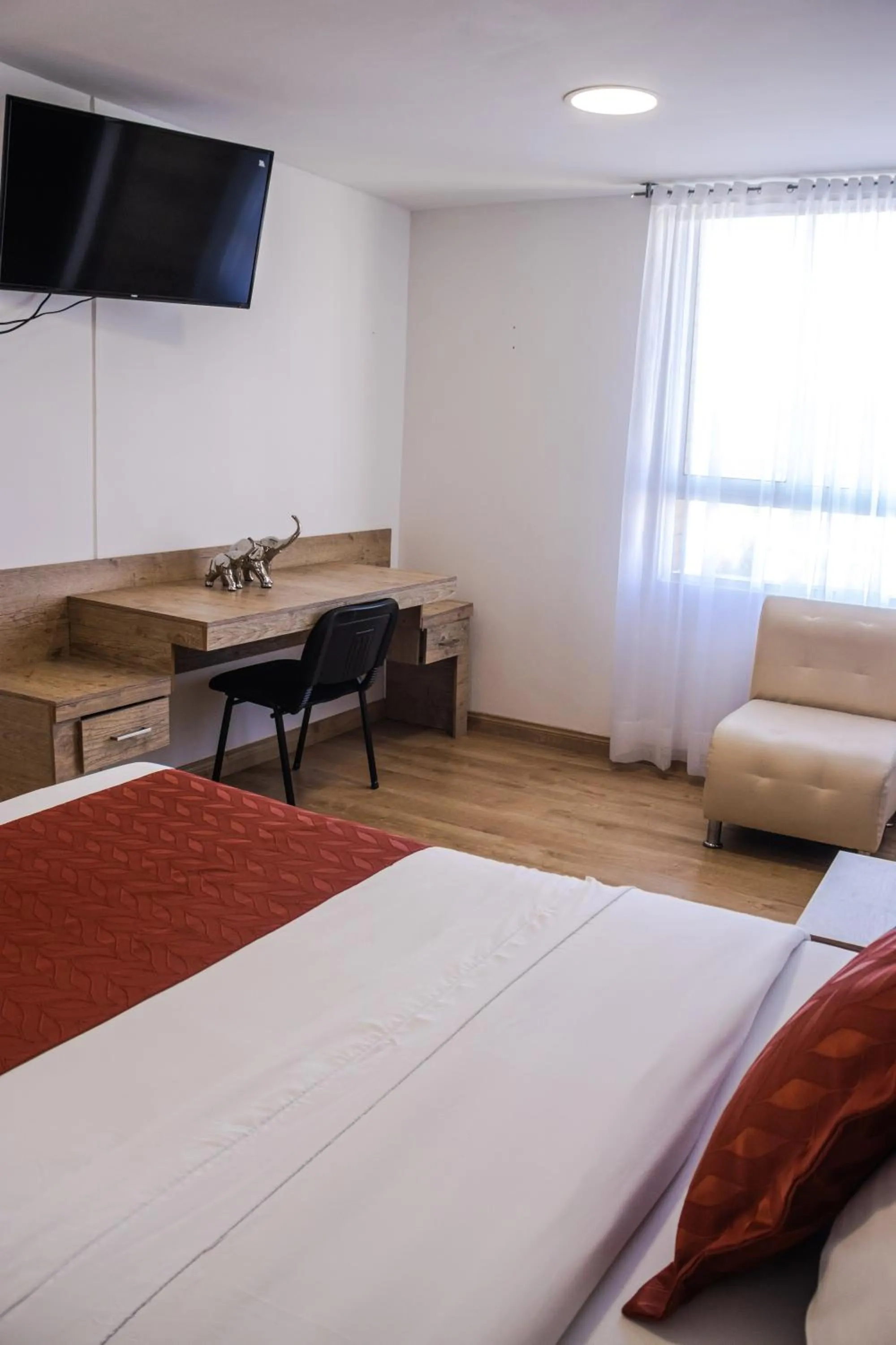 Photo of the whole room, Bed in Nogal Suite Hotel Ipiales