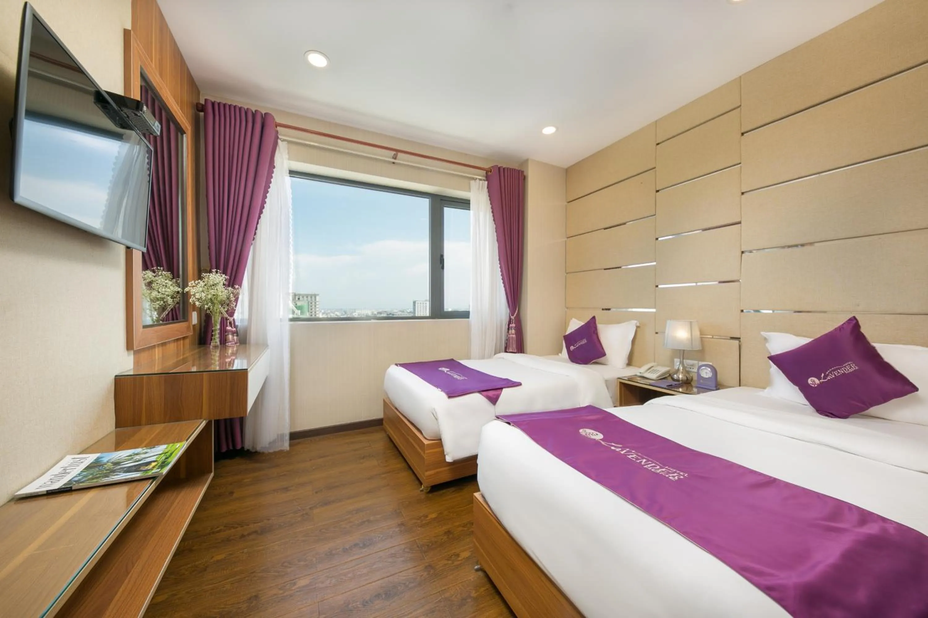 Bed in Lavender Riverside Hotel