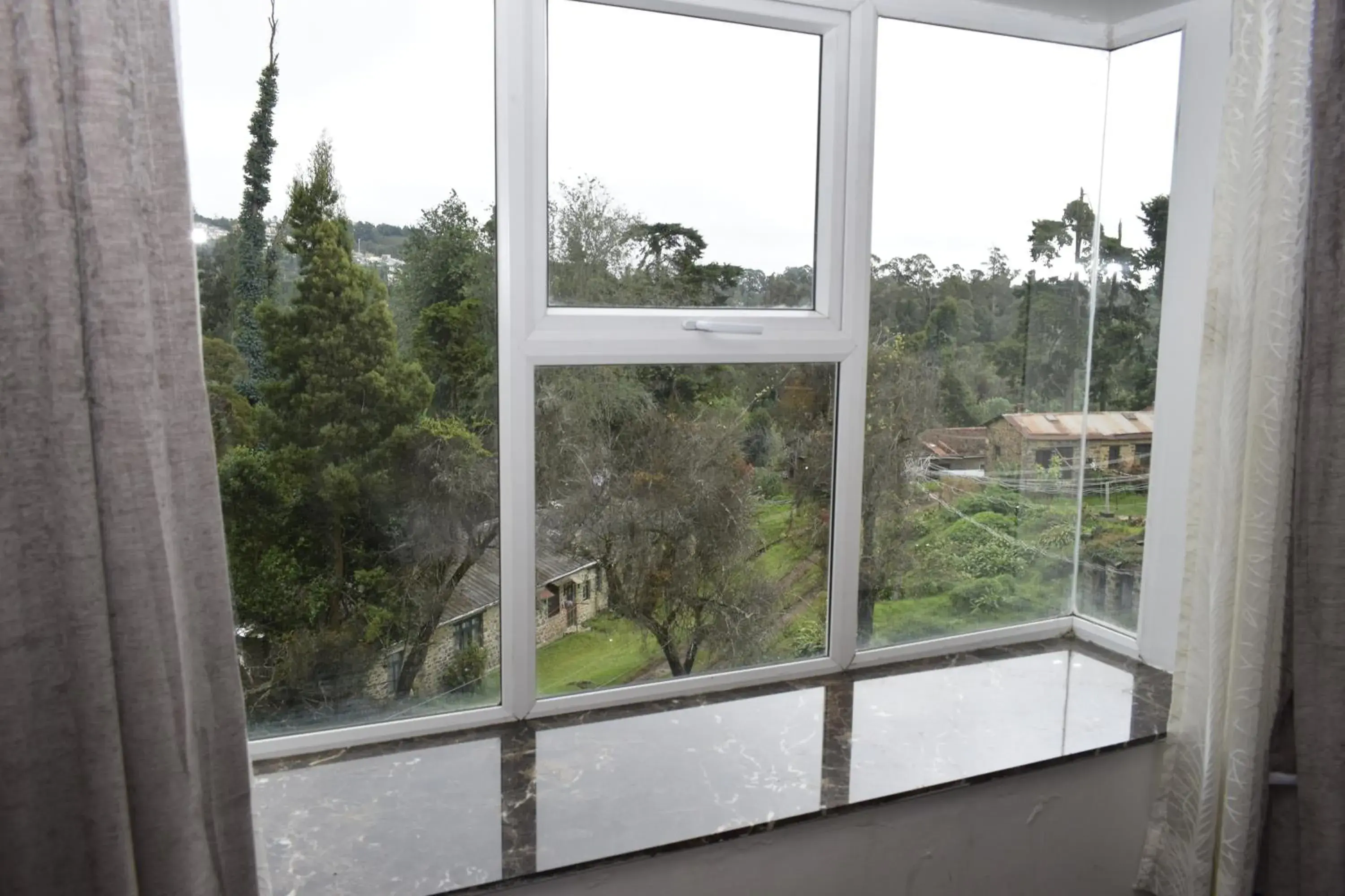 Garden view in The Hamuse Hotel Kodaikanal - Luxury Redefined Garden view in The Hamuse Hotel Kodaikanal - Luxury Redefined