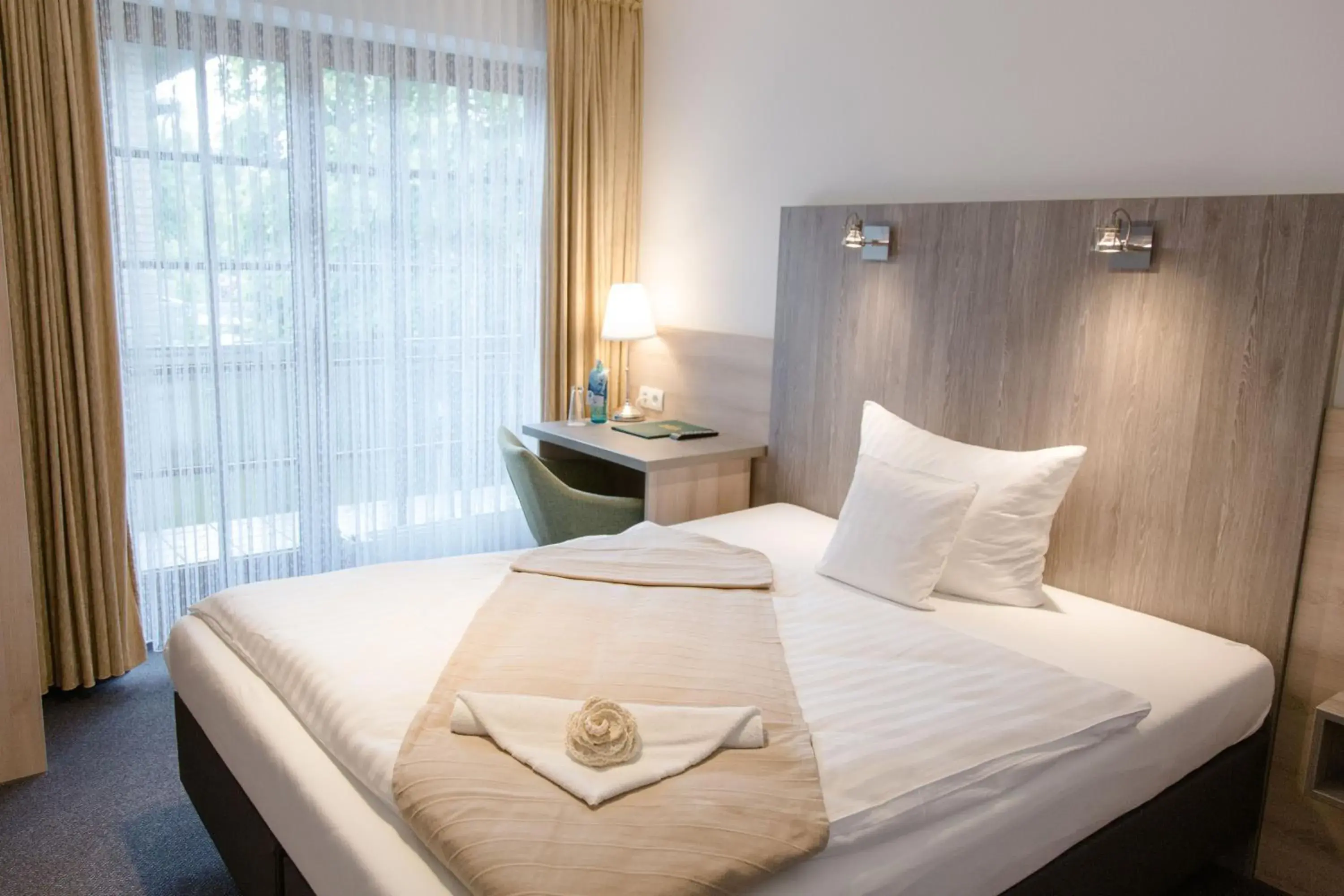 Bed in Friesen Hotel Bed in Friesen Hotel