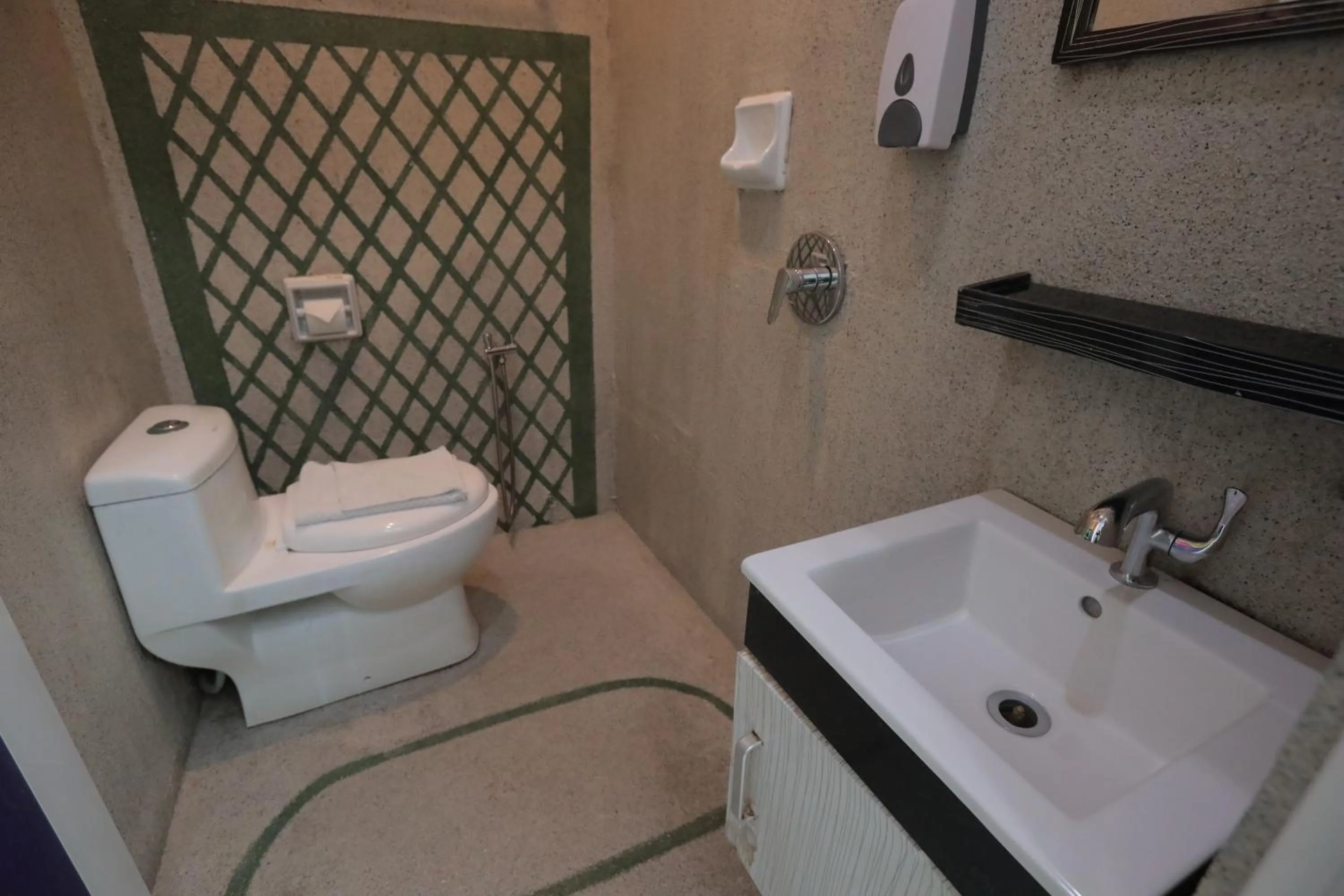 Bedroom in DJ Citi Point Hotel