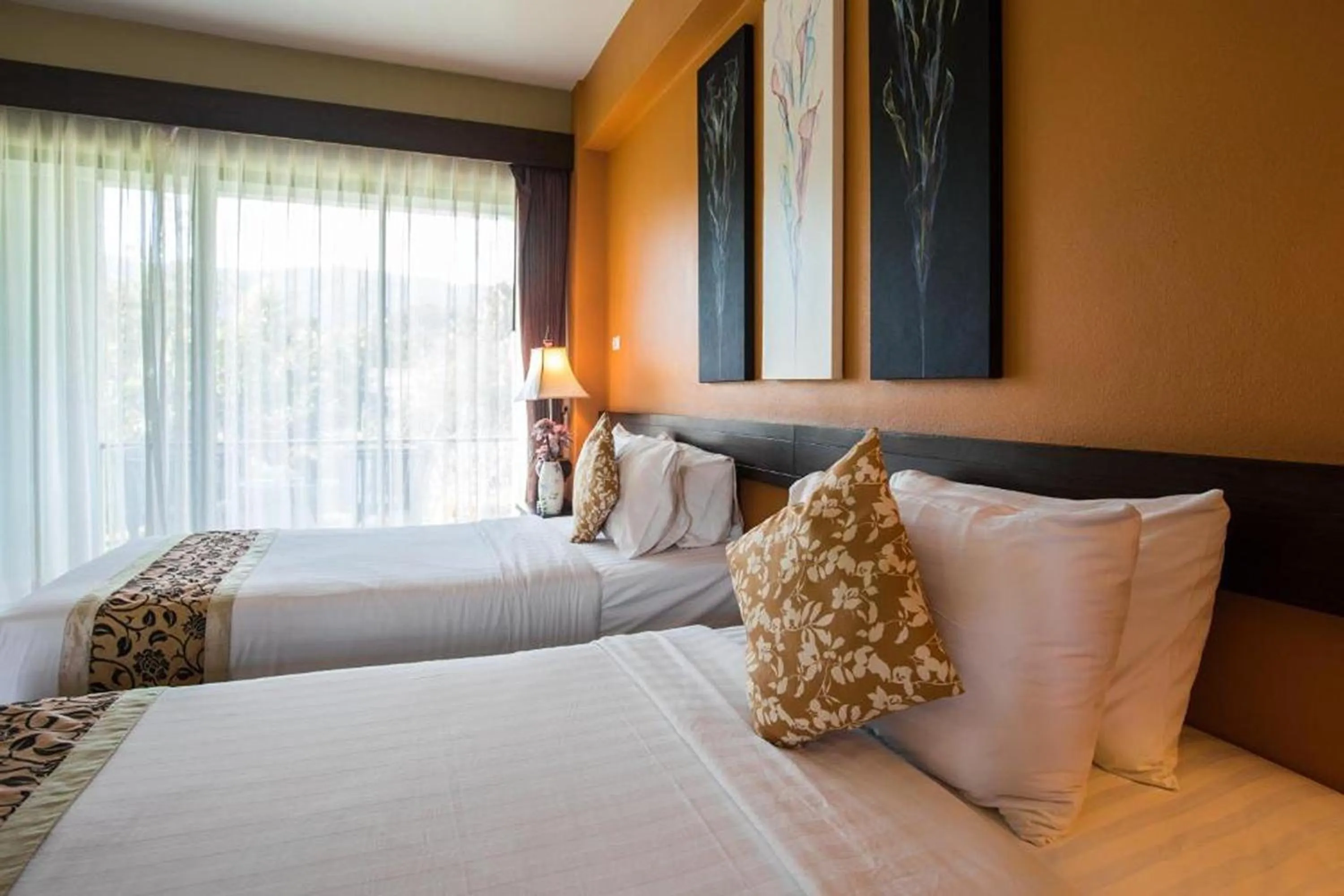 Photo of the whole room, Bed in Poonyamantra Resort Chiang Rai