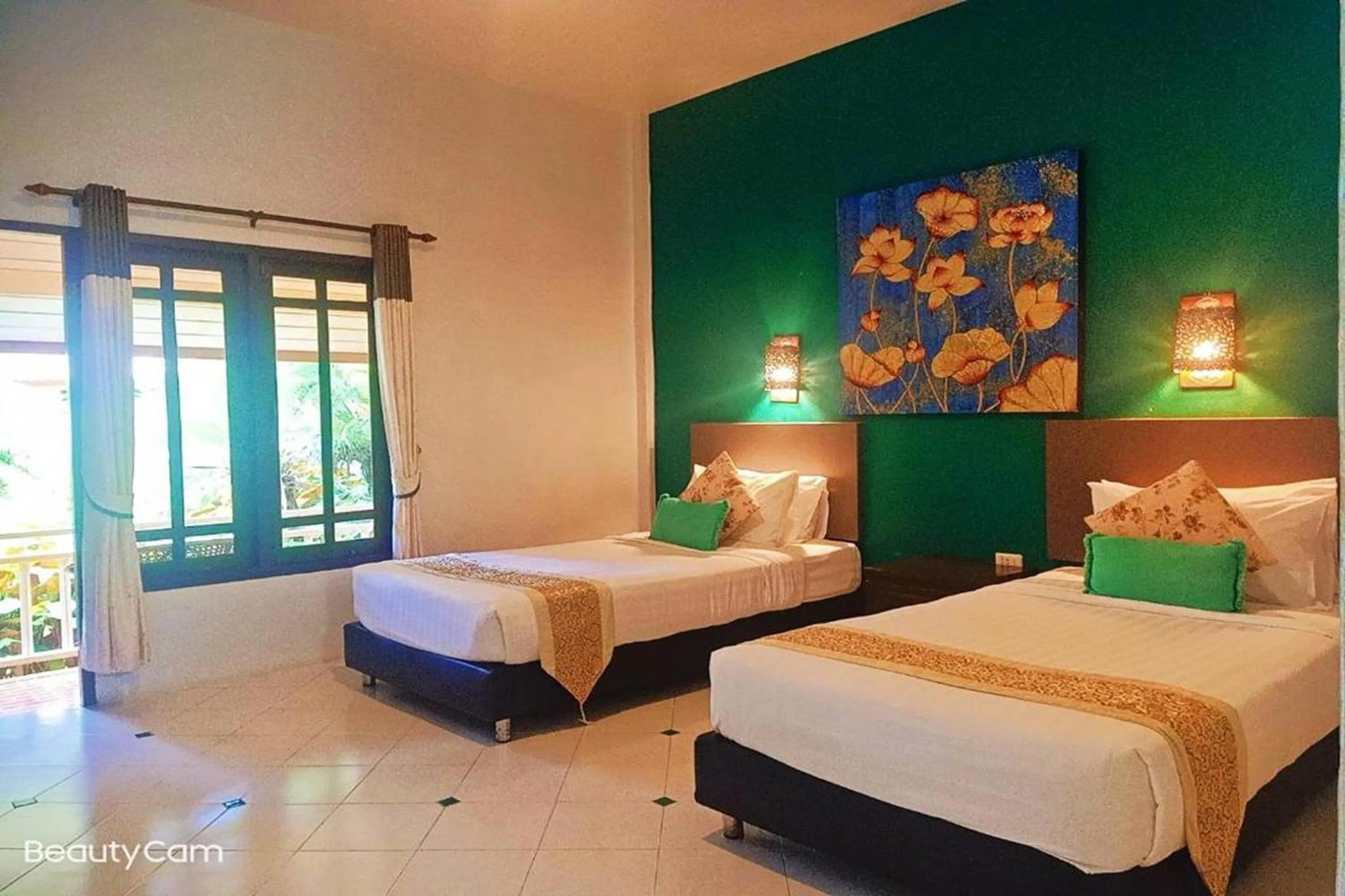 Photo of the whole room, Bed in Poonyamantra Resort Chiang Rai